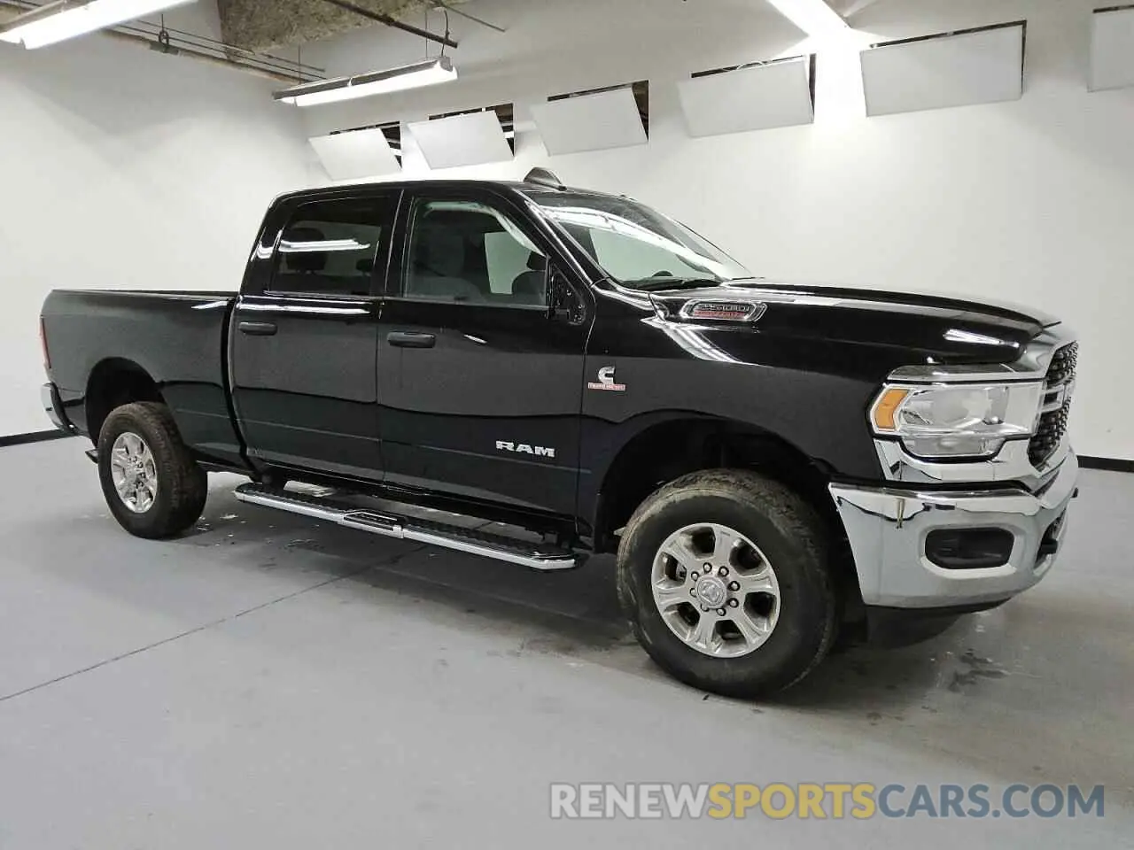 4 Photograph of a damaged car 3C6UR5DL1RG153608 RAM 2500 2024