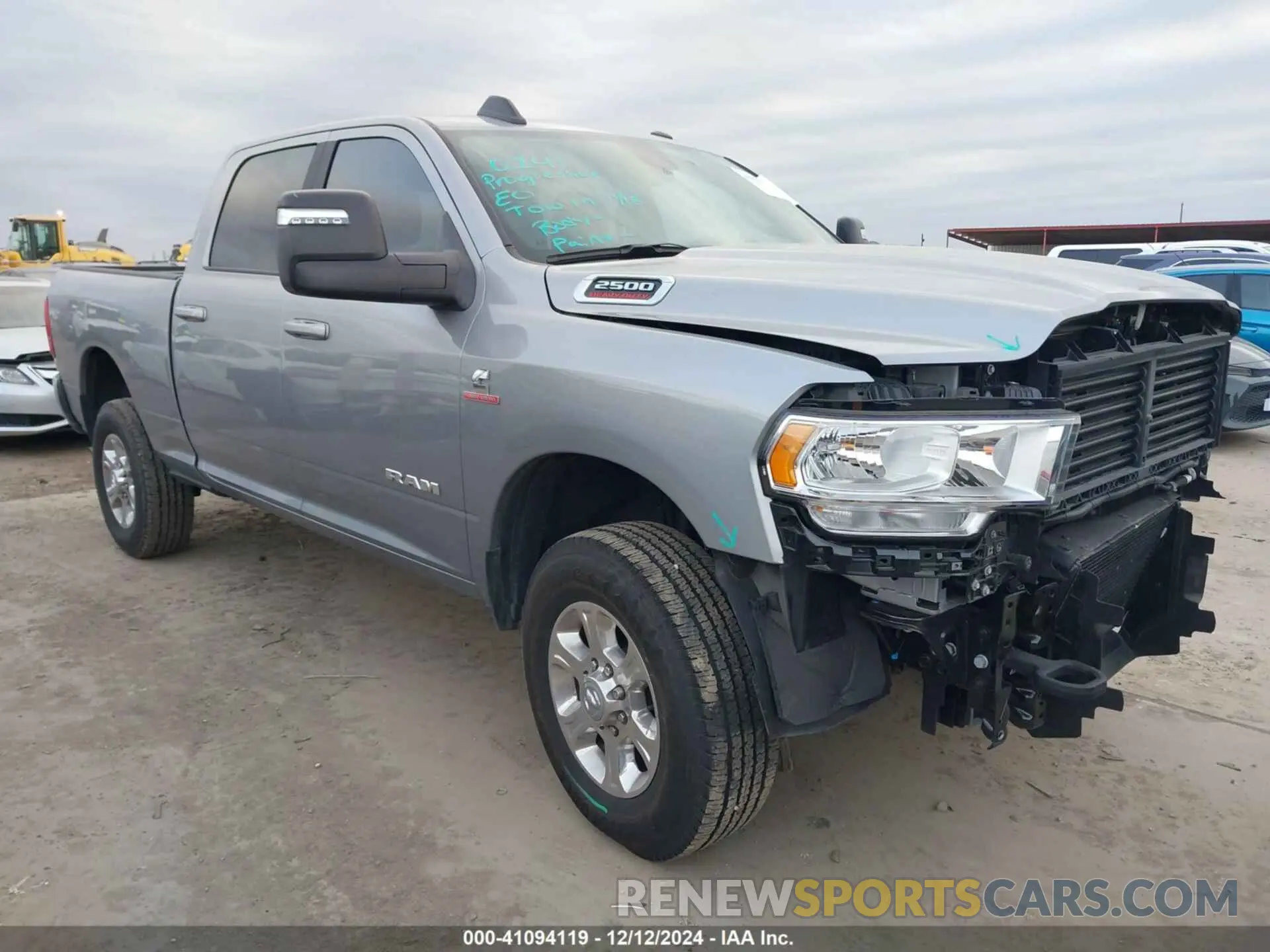 1 Photograph of a damaged car 3C6UR5DL1RG195695 RAM 2500 2024