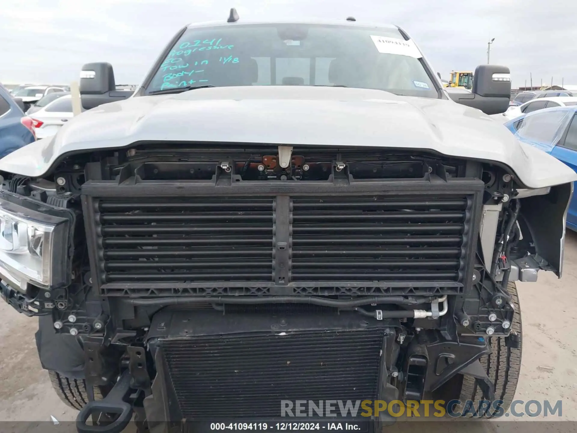 13 Photograph of a damaged car 3C6UR5DL1RG195695 RAM 2500 2024