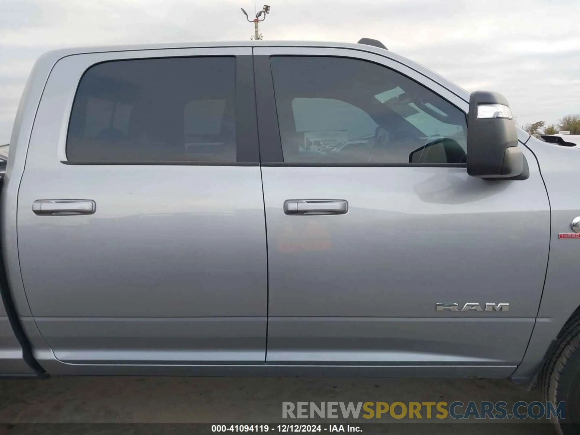 14 Photograph of a damaged car 3C6UR5DL1RG195695 RAM 2500 2024