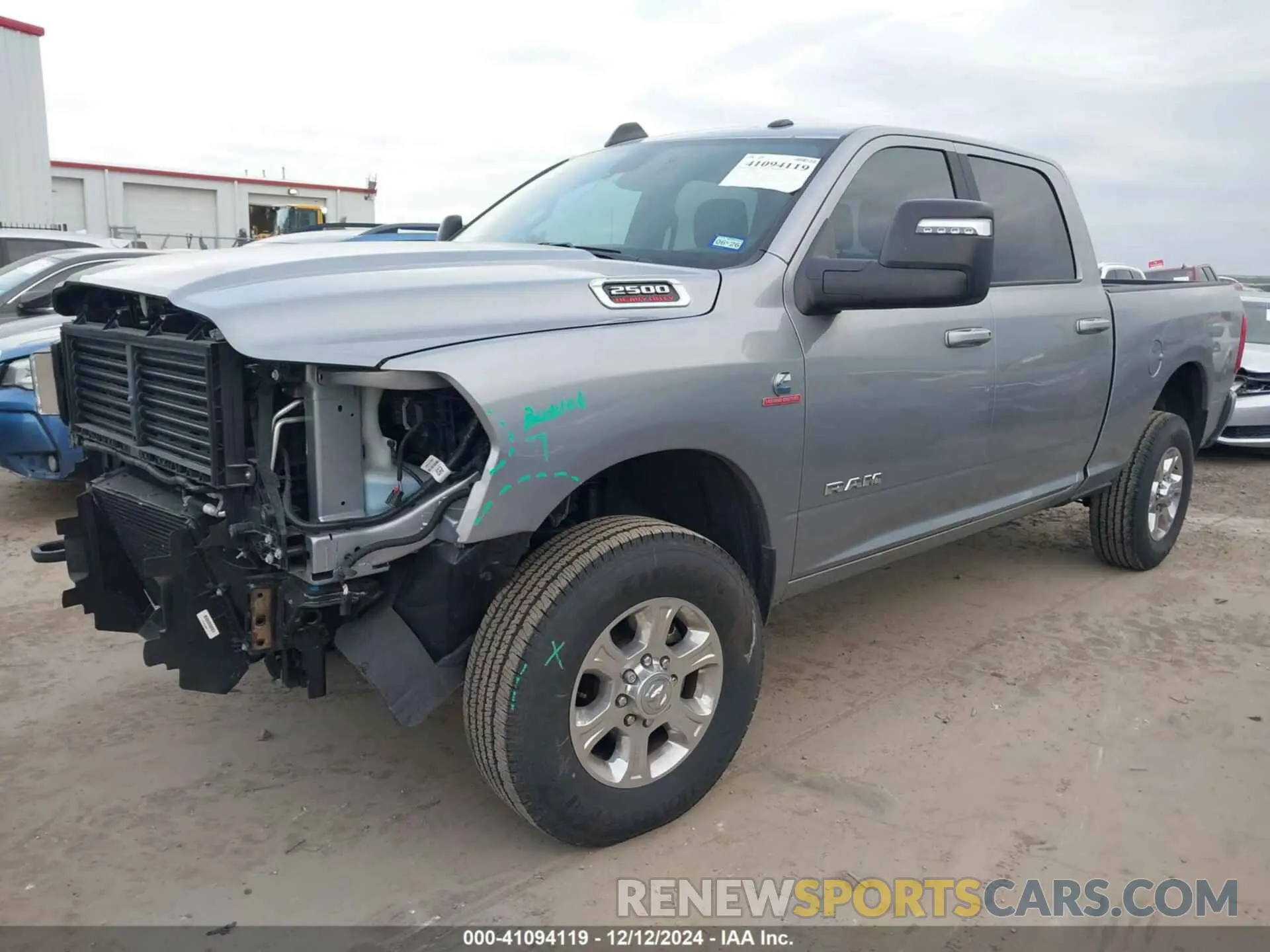 2 Photograph of a damaged car 3C6UR5DL1RG195695 RAM 2500 2024
