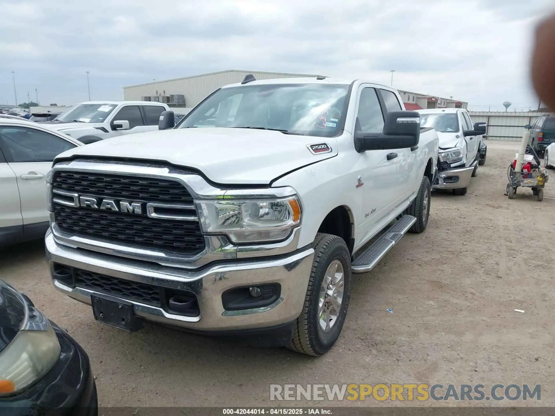 2 Photograph of a damaged car 3C6UR5DL1RG296302 RAM 2500 2024