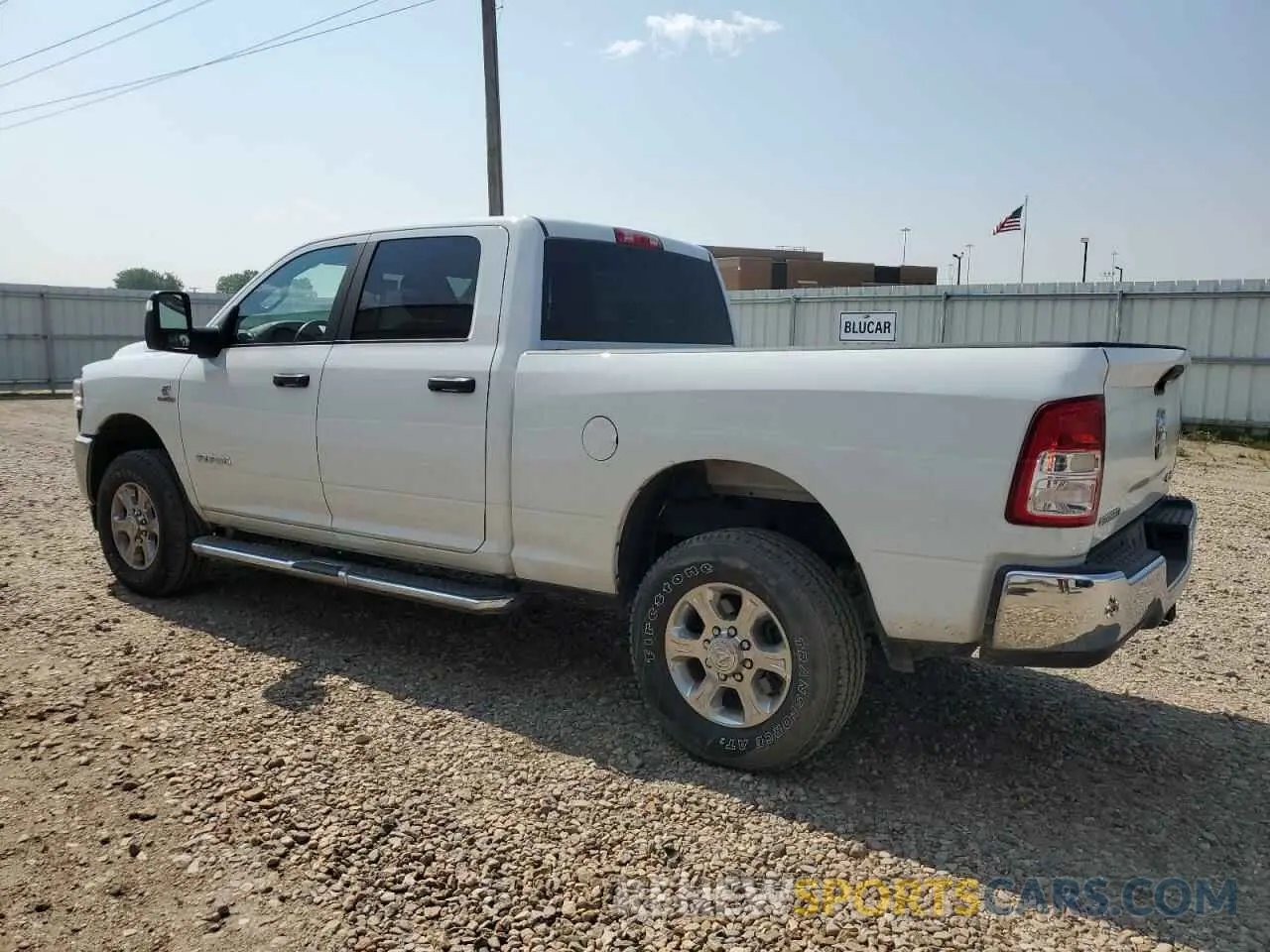 2 Photograph of a damaged car 3C6UR5DL1RG338502 RAM 2500 2024