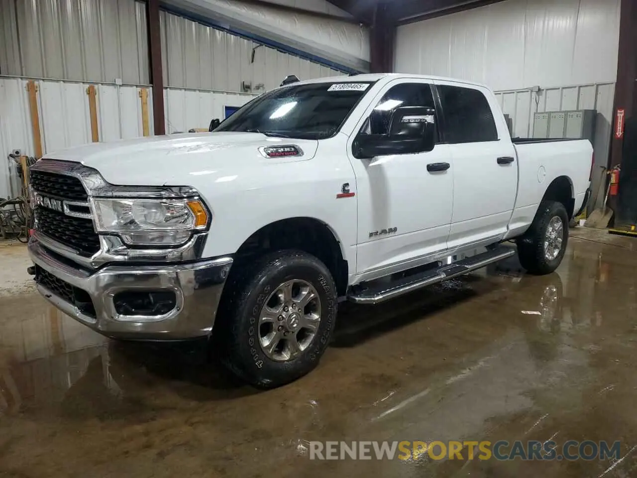 1 Photograph of a damaged car 3C6UR5DL2RG227179 RAM 2500 2024