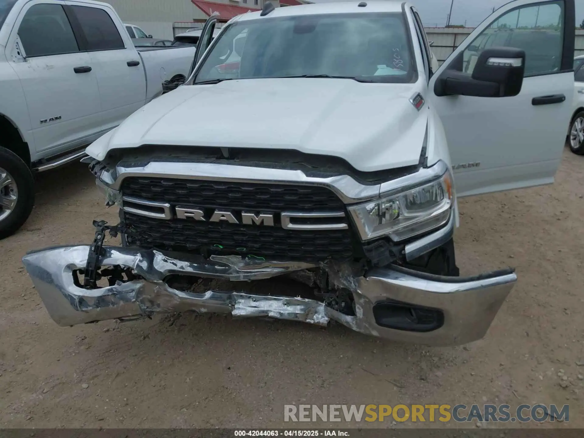 12 Photograph of a damaged car 3C6UR5DL2RG285616 RAM 2500 2024