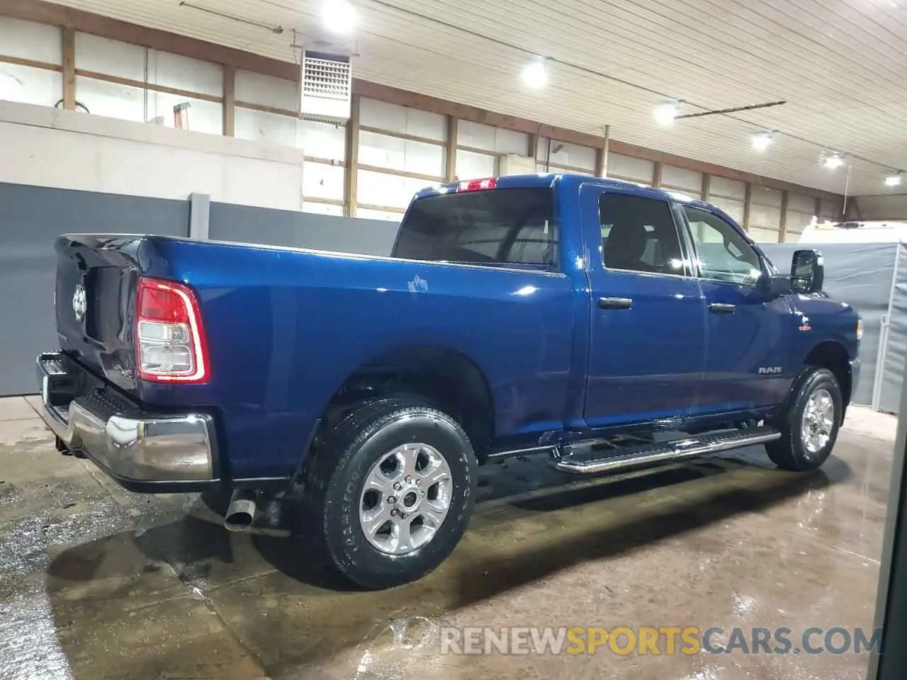 3 Photograph of a damaged car 3C6UR5DL3RG157773 RAM 2500 2024
