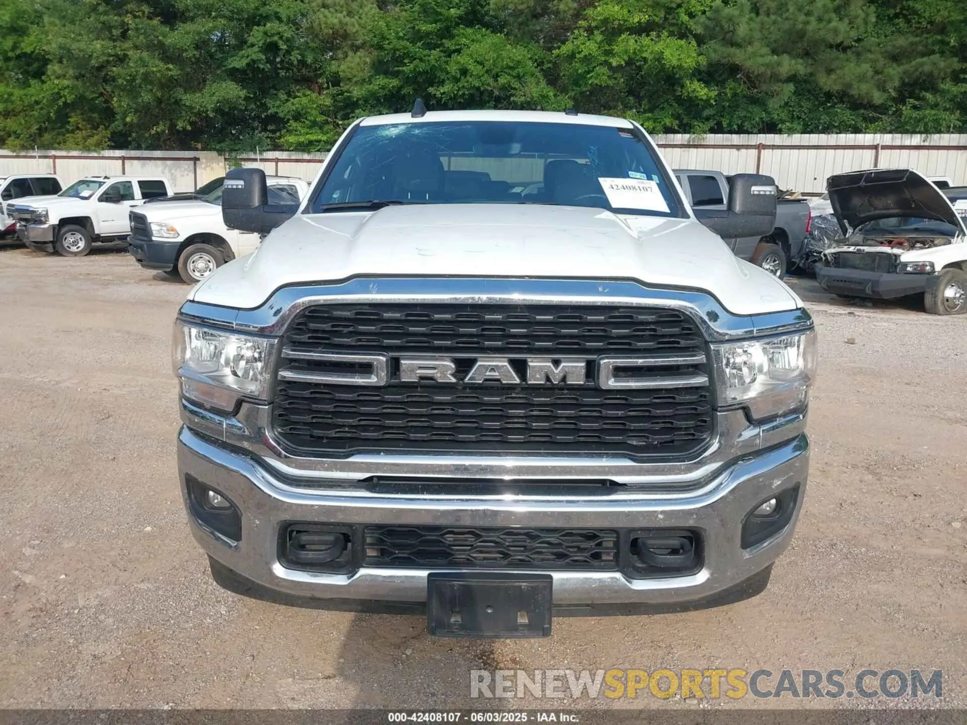 12 Photograph of a damaged car 3C6UR5DL3RG303931 RAM 2500 2024