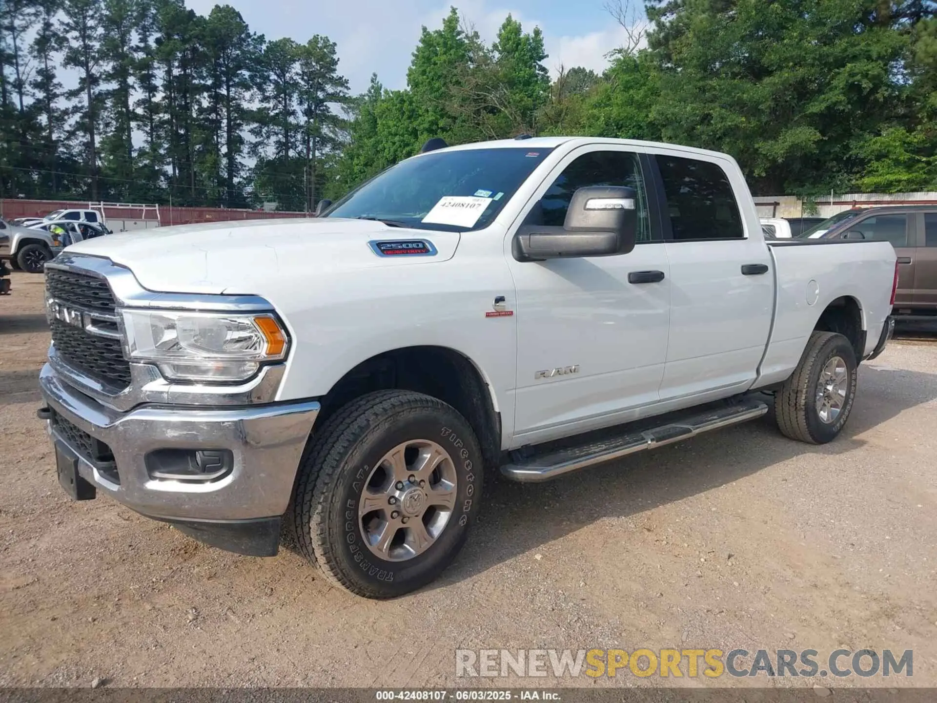2 Photograph of a damaged car 3C6UR5DL3RG303931 RAM 2500 2024