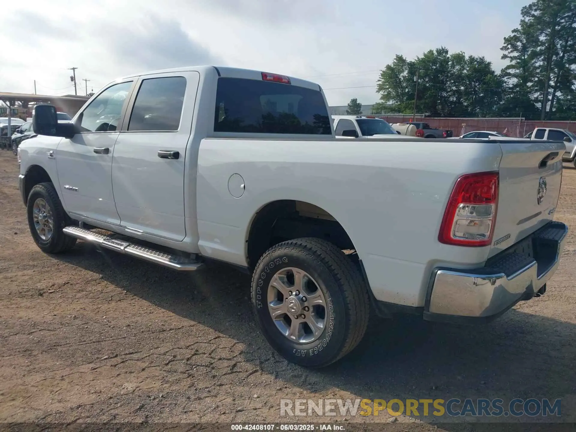 3 Photograph of a damaged car 3C6UR5DL3RG303931 RAM 2500 2024