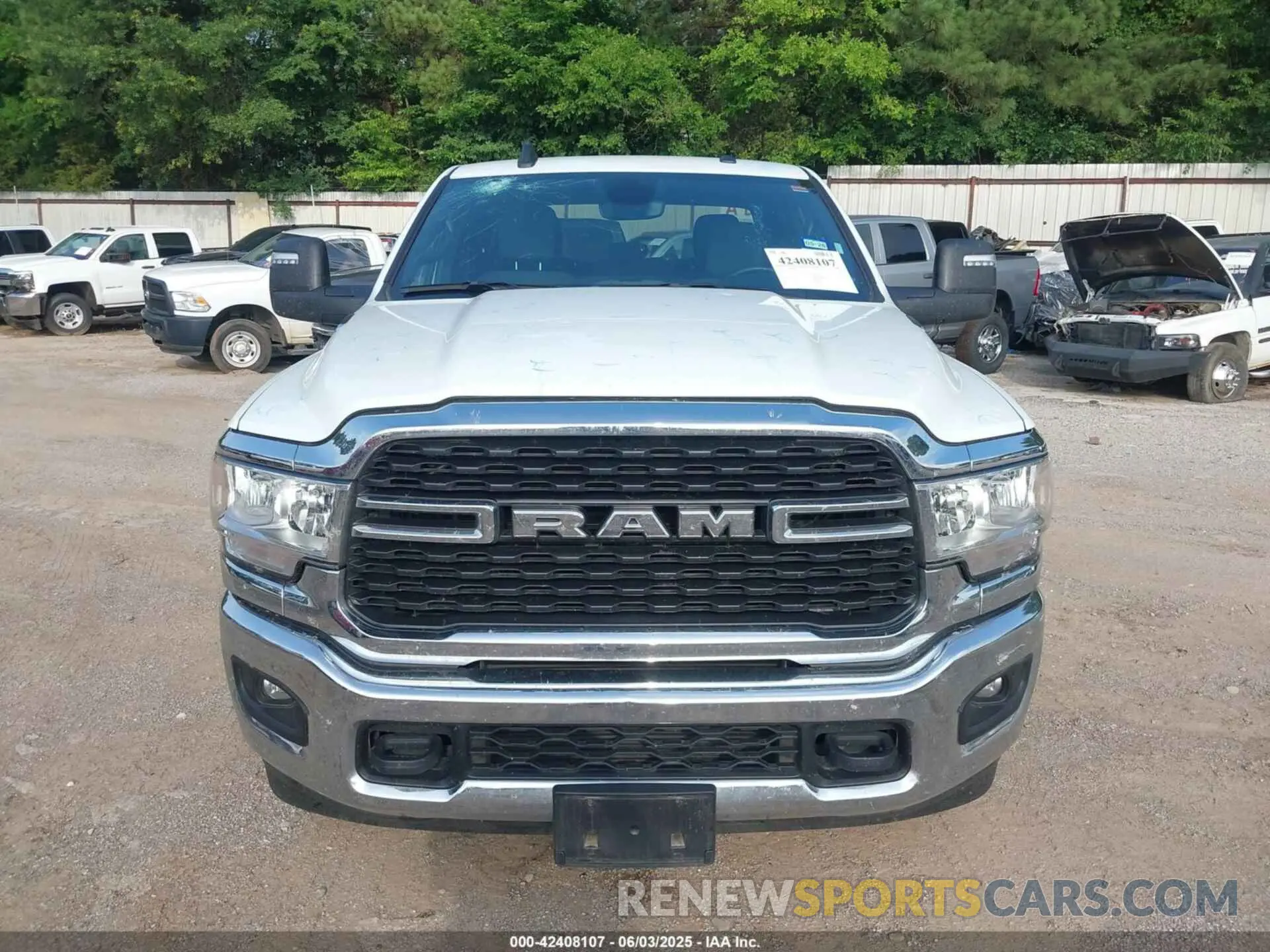 6 Photograph of a damaged car 3C6UR5DL3RG303931 RAM 2500 2024