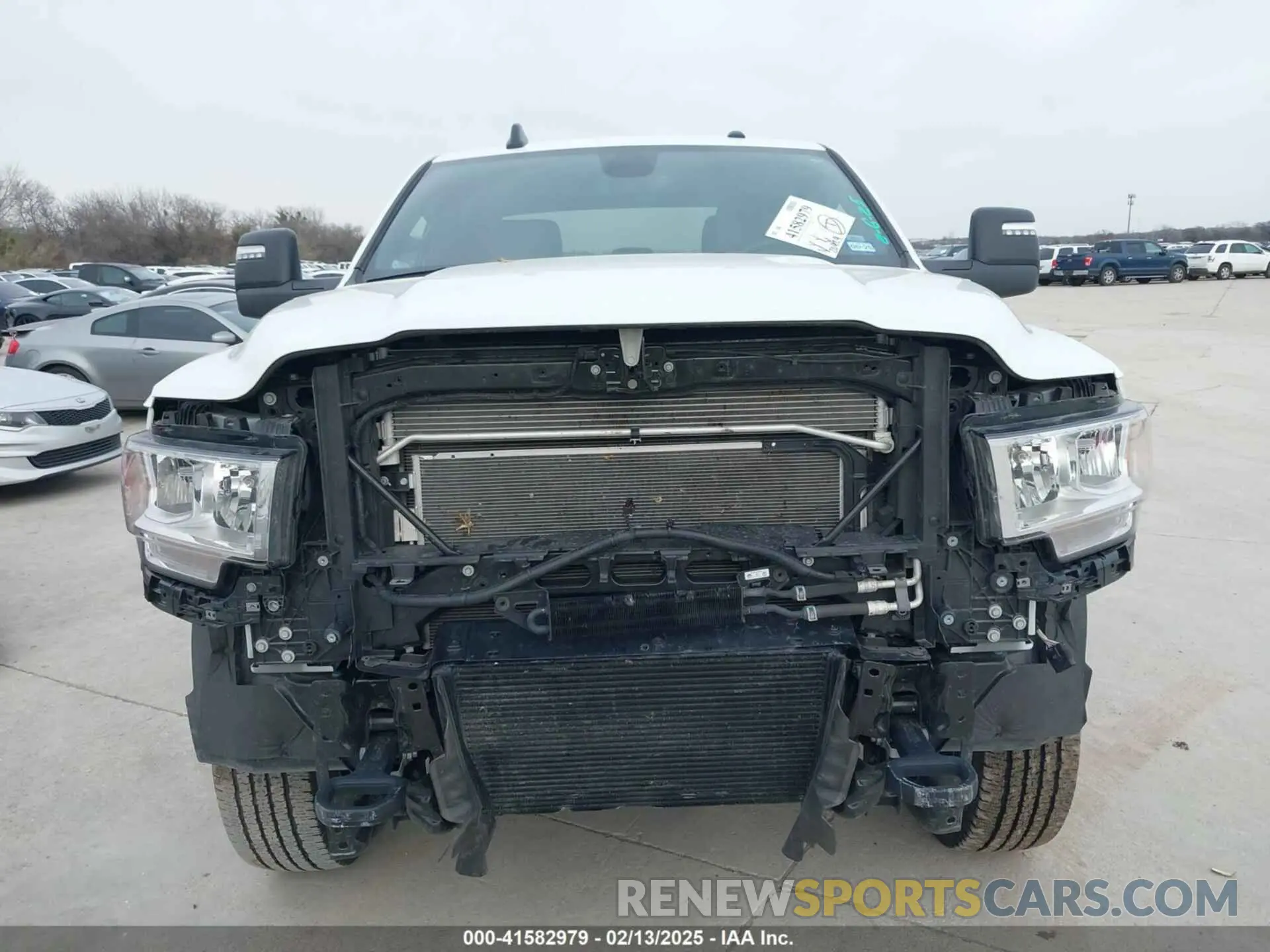 12 Photograph of a damaged car 3C6UR5DL3RG339974 RAM 2500 2024