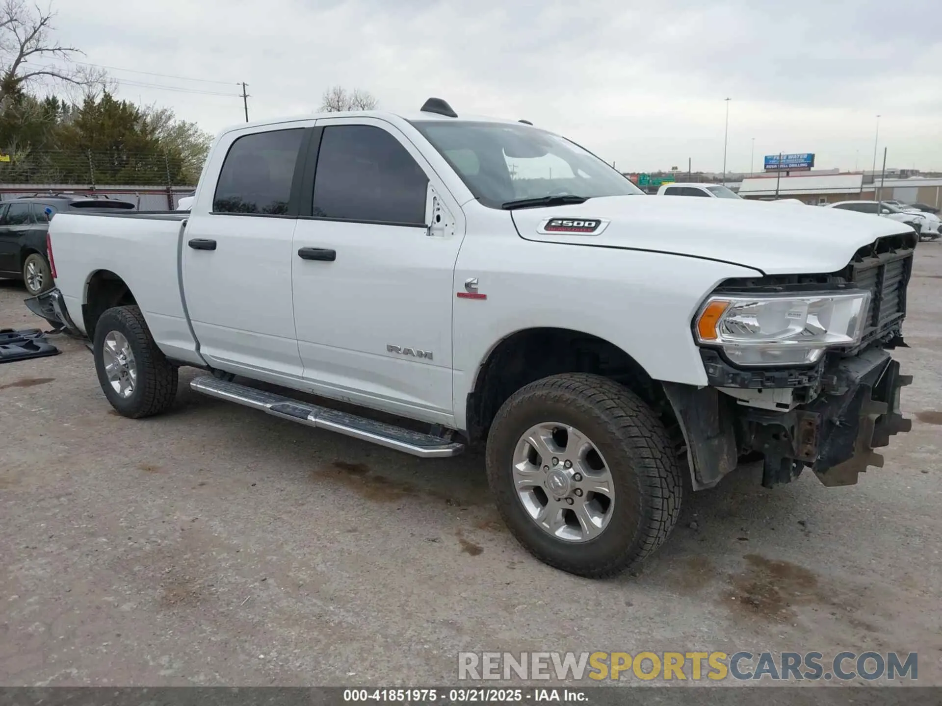 1 Photograph of a damaged car 3C6UR5DL4RG233291 RAM 2500 2024