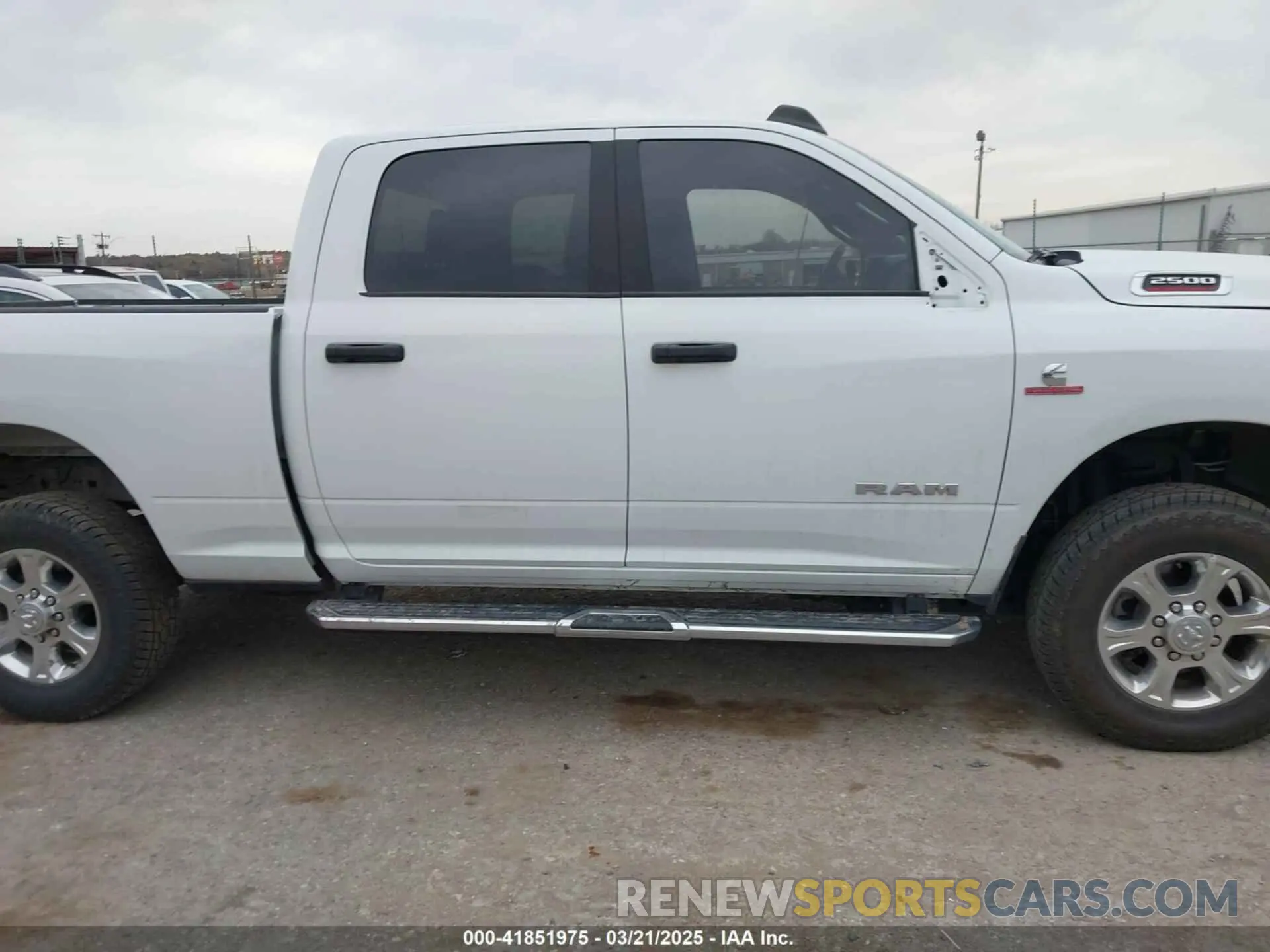 14 Photograph of a damaged car 3C6UR5DL4RG233291 RAM 2500 2024