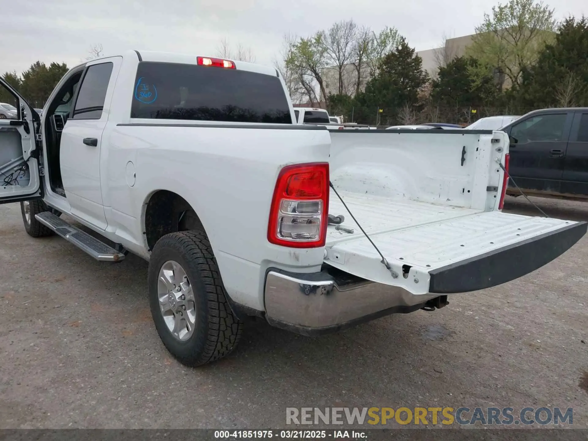 3 Photograph of a damaged car 3C6UR5DL4RG233291 RAM 2500 2024