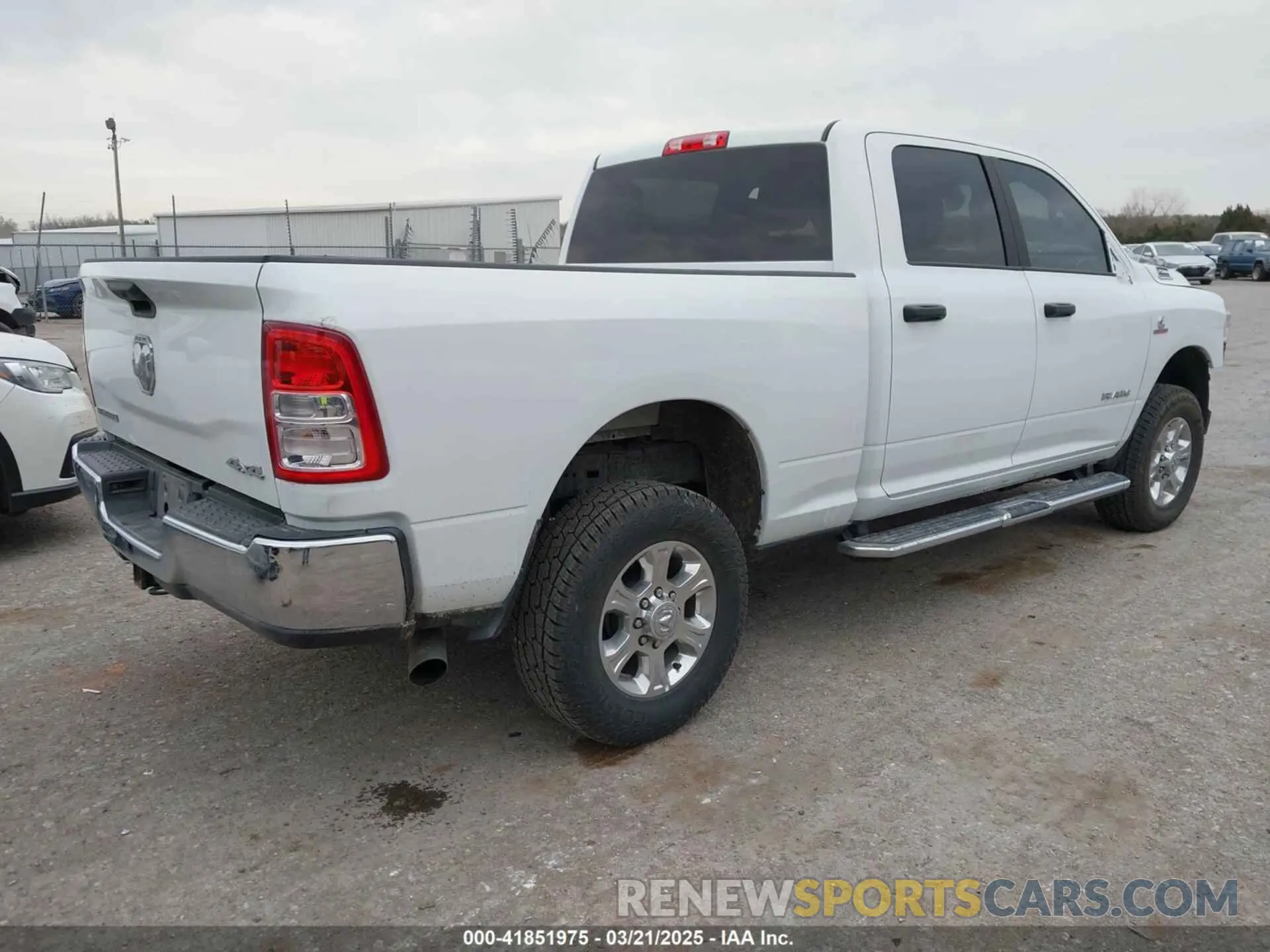 4 Photograph of a damaged car 3C6UR5DL4RG233291 RAM 2500 2024