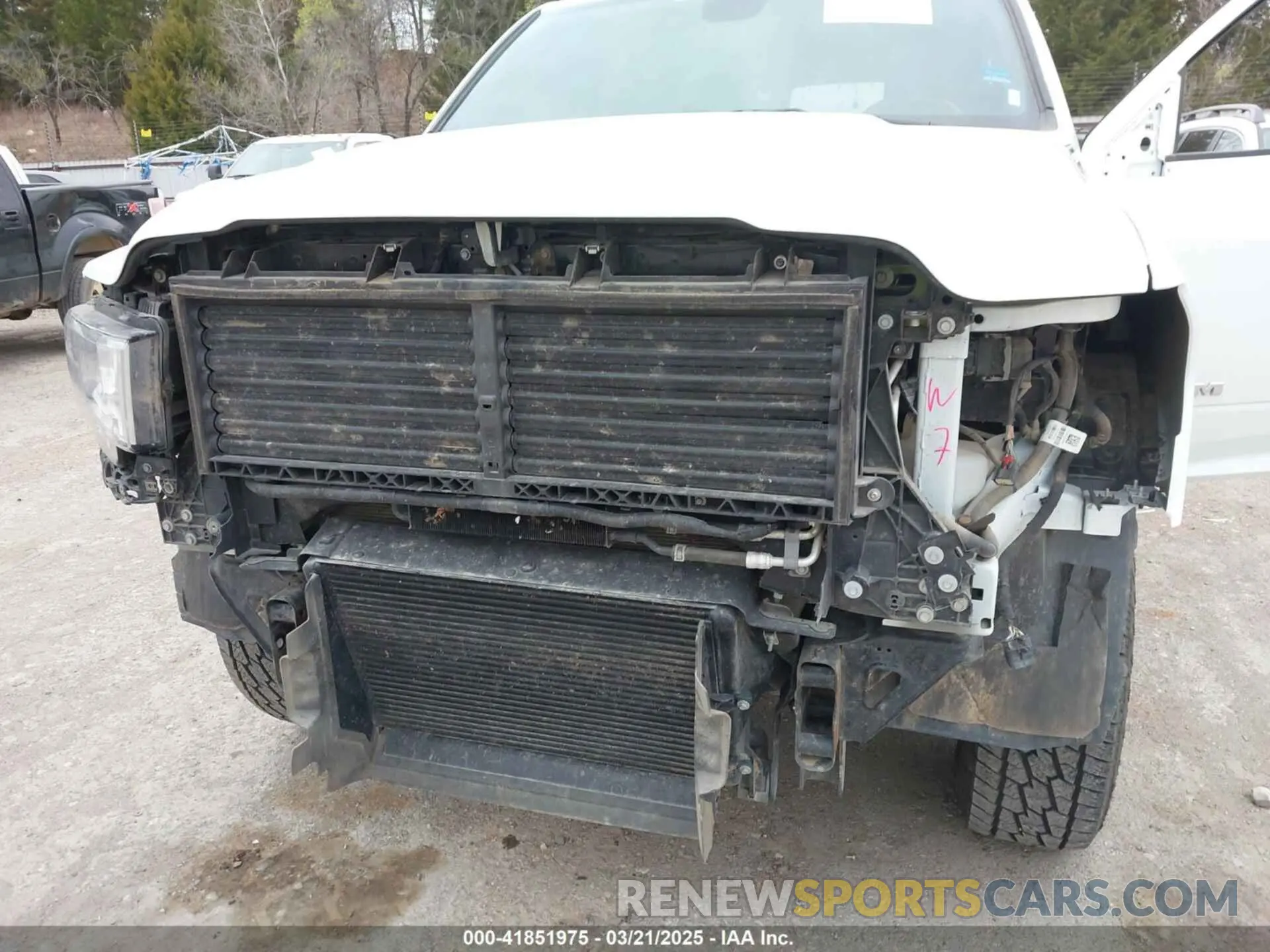 6 Photograph of a damaged car 3C6UR5DL4RG233291 RAM 2500 2024
