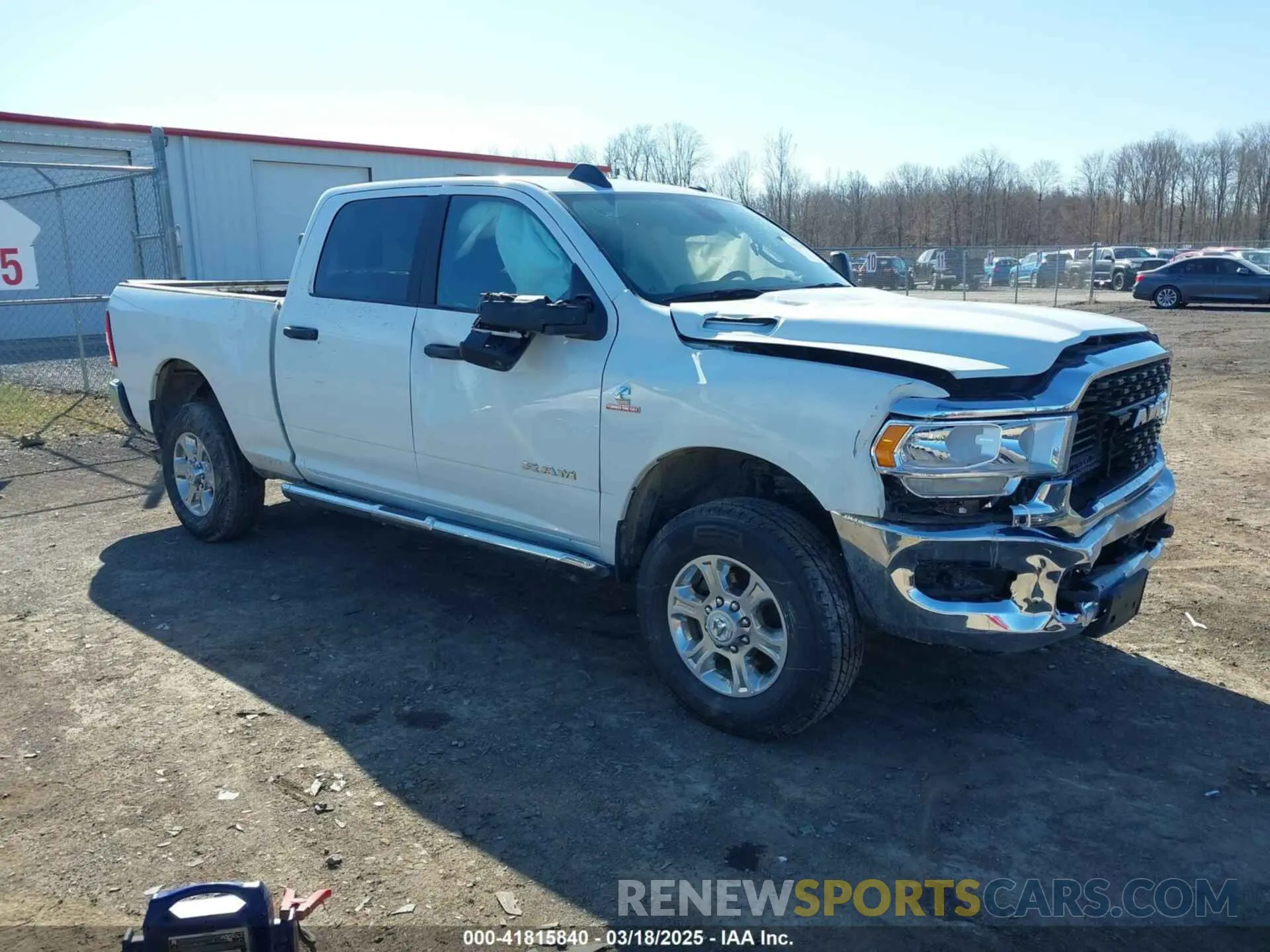 1 Photograph of a damaged car 3C6UR5DL4RG285892 RAM 2500 2024