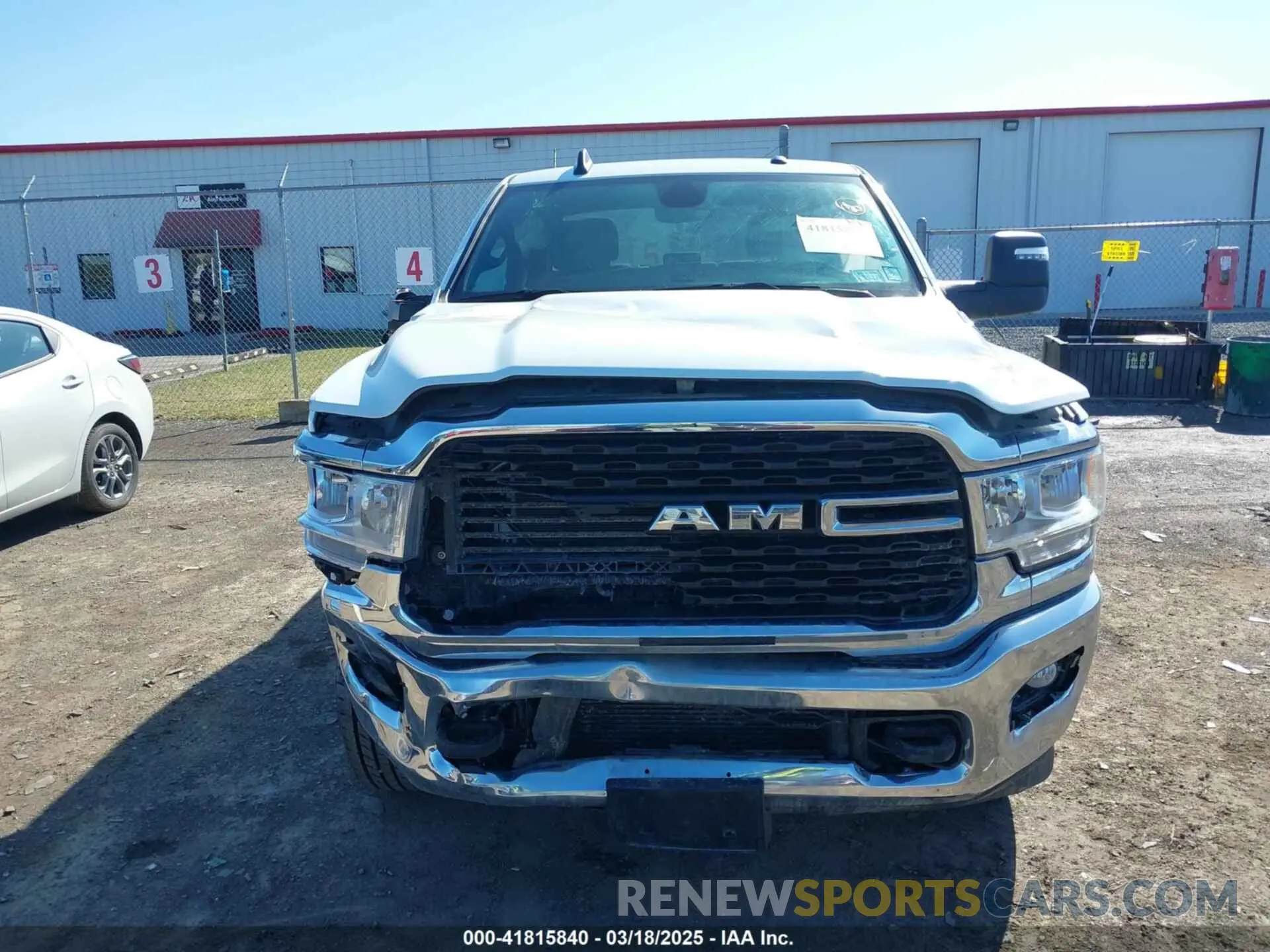 12 Photograph of a damaged car 3C6UR5DL4RG285892 RAM 2500 2024