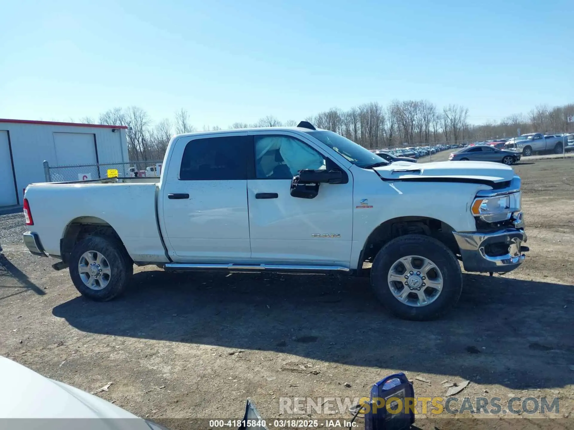 13 Photograph of a damaged car 3C6UR5DL4RG285892 RAM 2500 2024