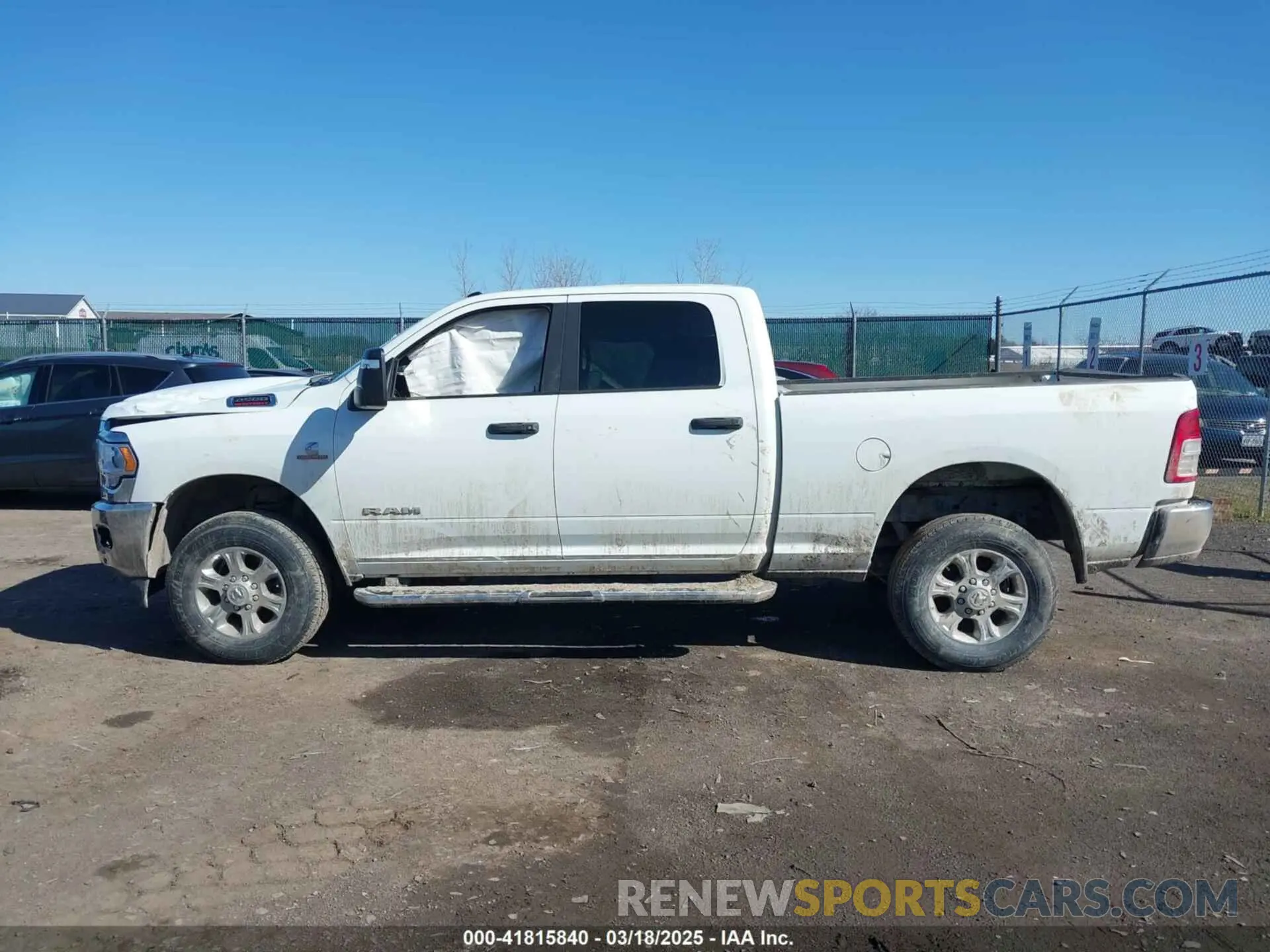14 Photograph of a damaged car 3C6UR5DL4RG285892 RAM 2500 2024