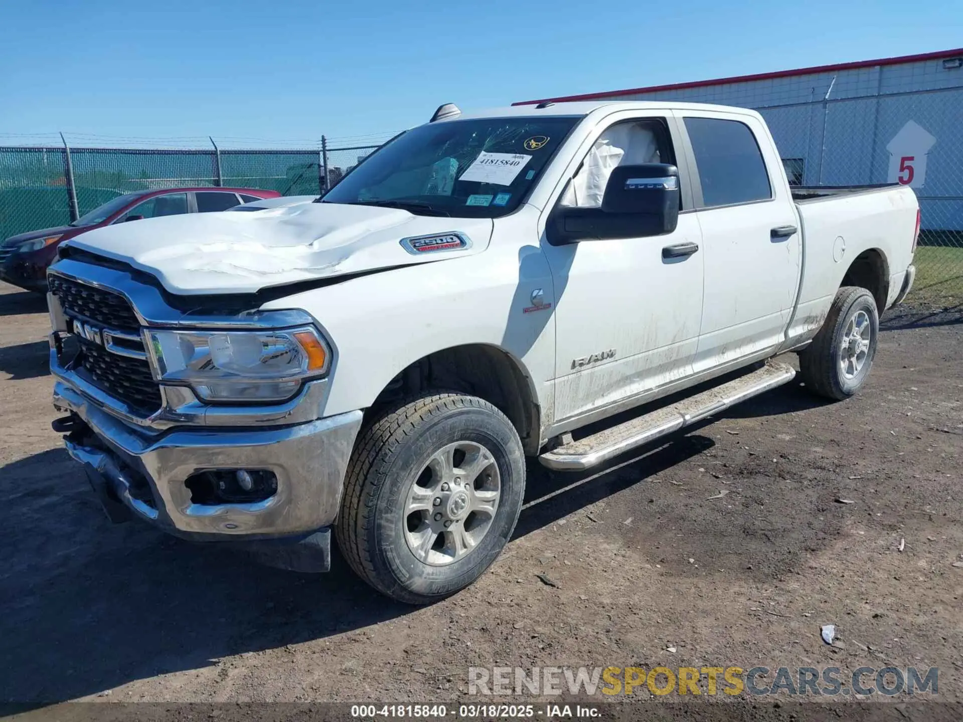 2 Photograph of a damaged car 3C6UR5DL4RG285892 RAM 2500 2024