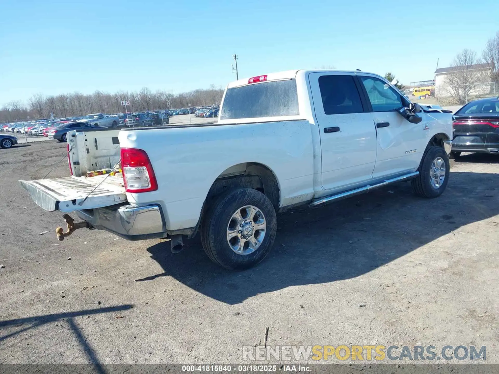4 Photograph of a damaged car 3C6UR5DL4RG285892 RAM 2500 2024