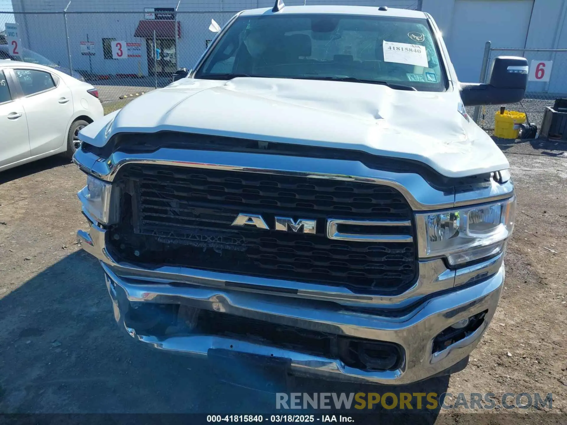 6 Photograph of a damaged car 3C6UR5DL4RG285892 RAM 2500 2024