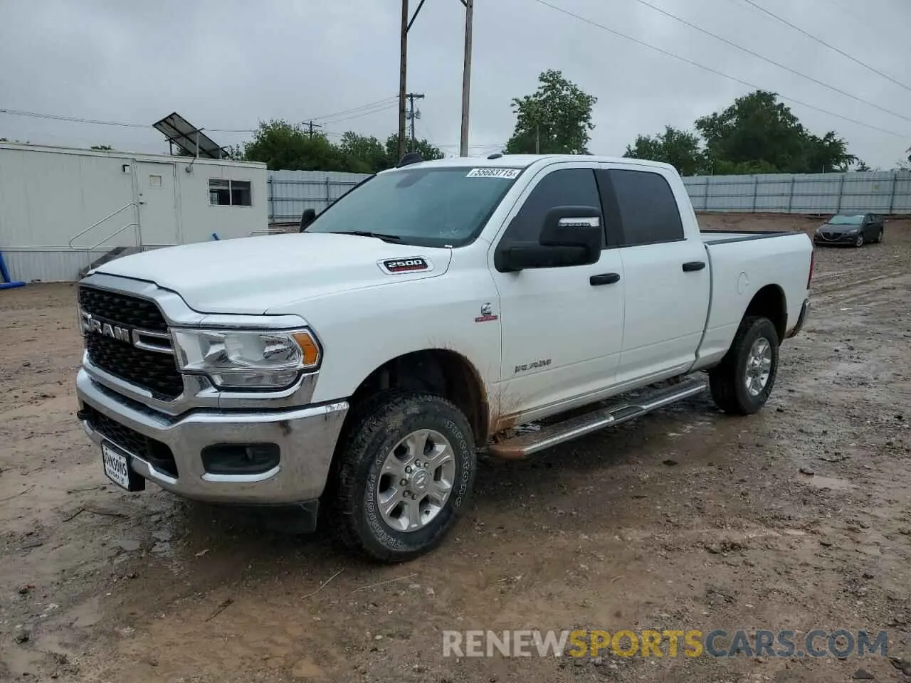 1 Photograph of a damaged car 3C6UR5DL4RG384549 RAM 2500 2024