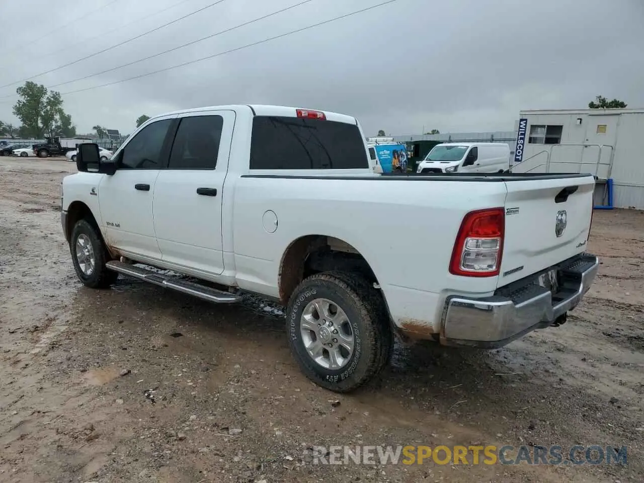 2 Photograph of a damaged car 3C6UR5DL4RG384549 RAM 2500 2024