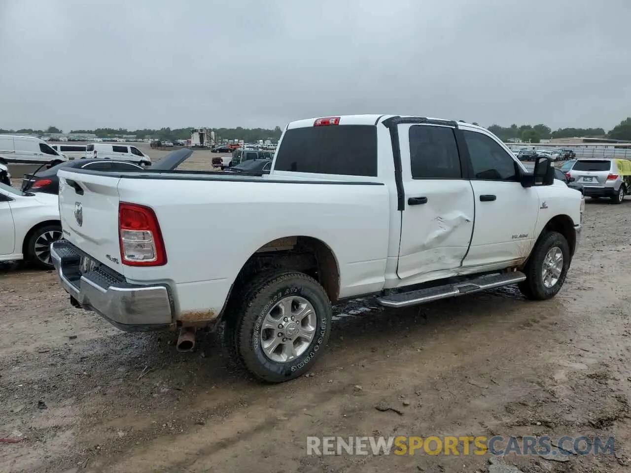3 Photograph of a damaged car 3C6UR5DL4RG384549 RAM 2500 2024