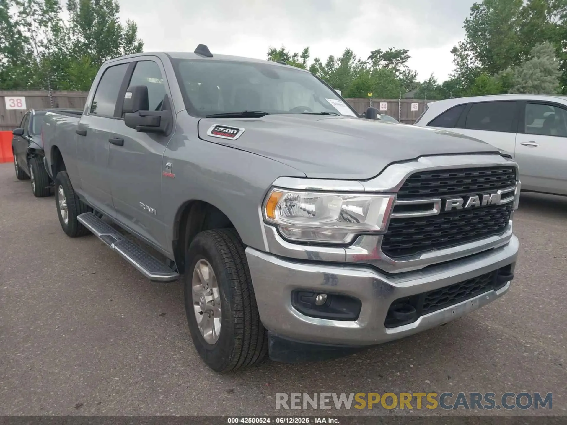 1 Photograph of a damaged car 3C6UR5DL5RG154048 RAM 2500 2024