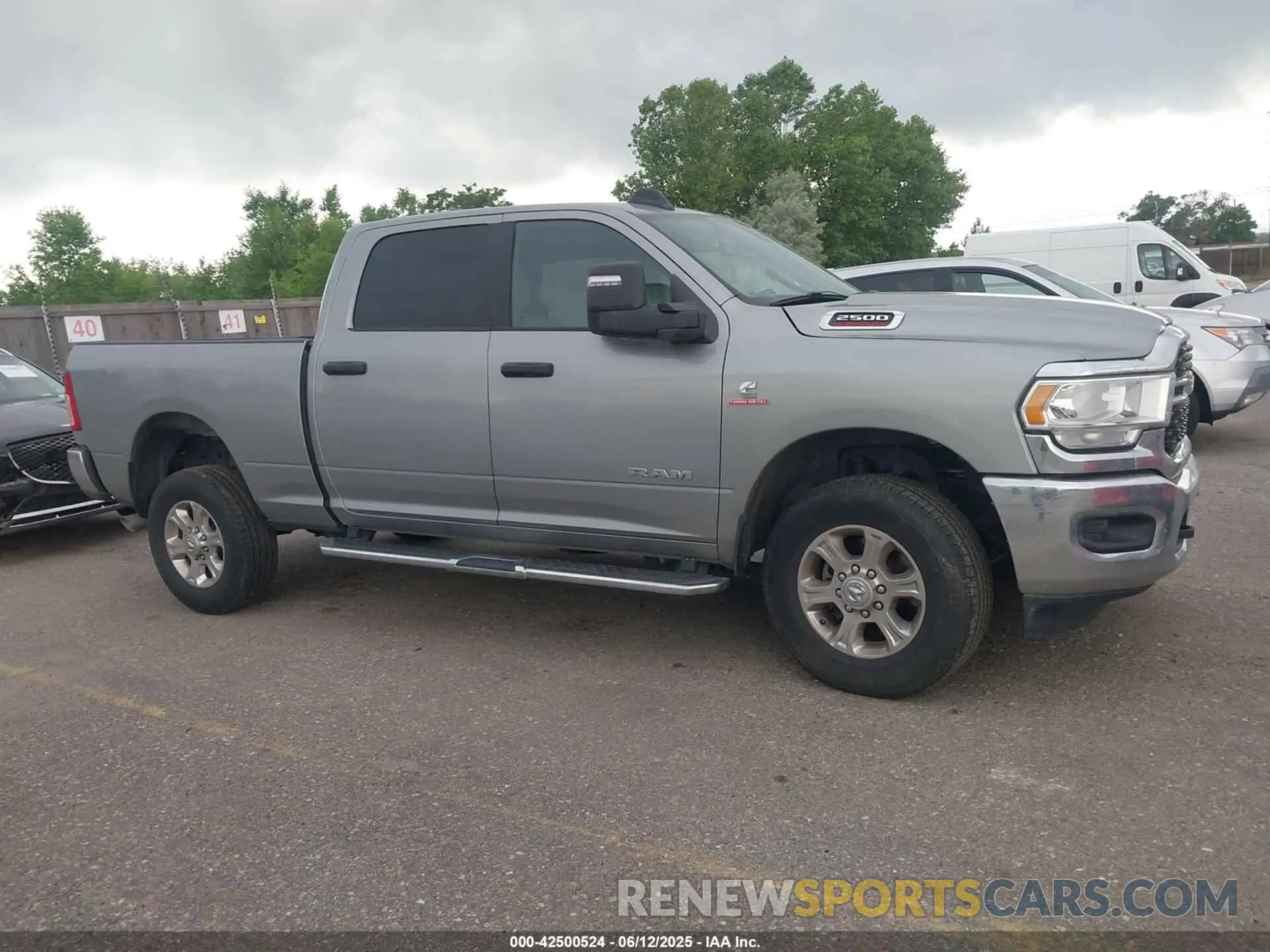 13 Photograph of a damaged car 3C6UR5DL5RG154048 RAM 2500 2024
