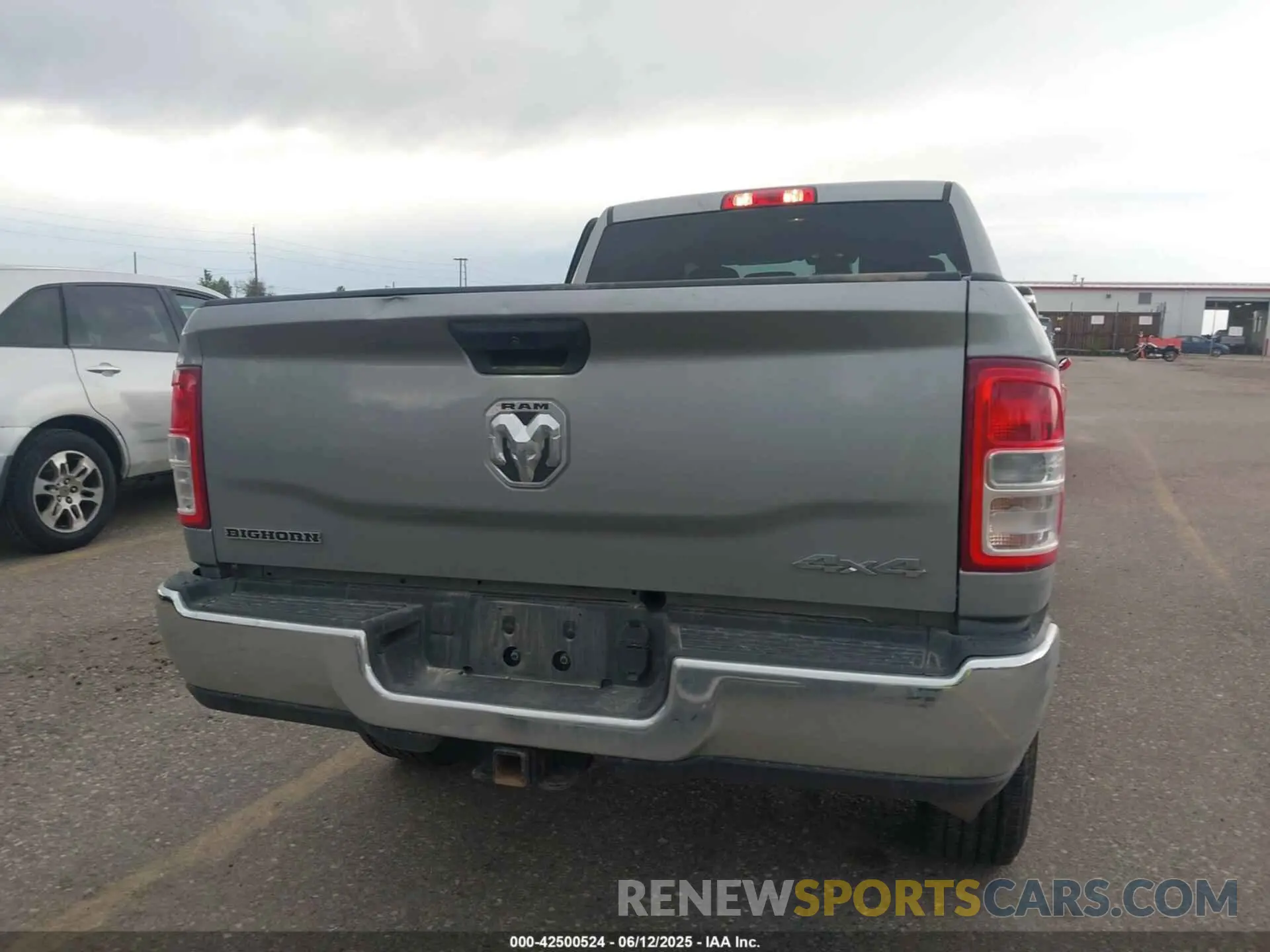 16 Photograph of a damaged car 3C6UR5DL5RG154048 RAM 2500 2024