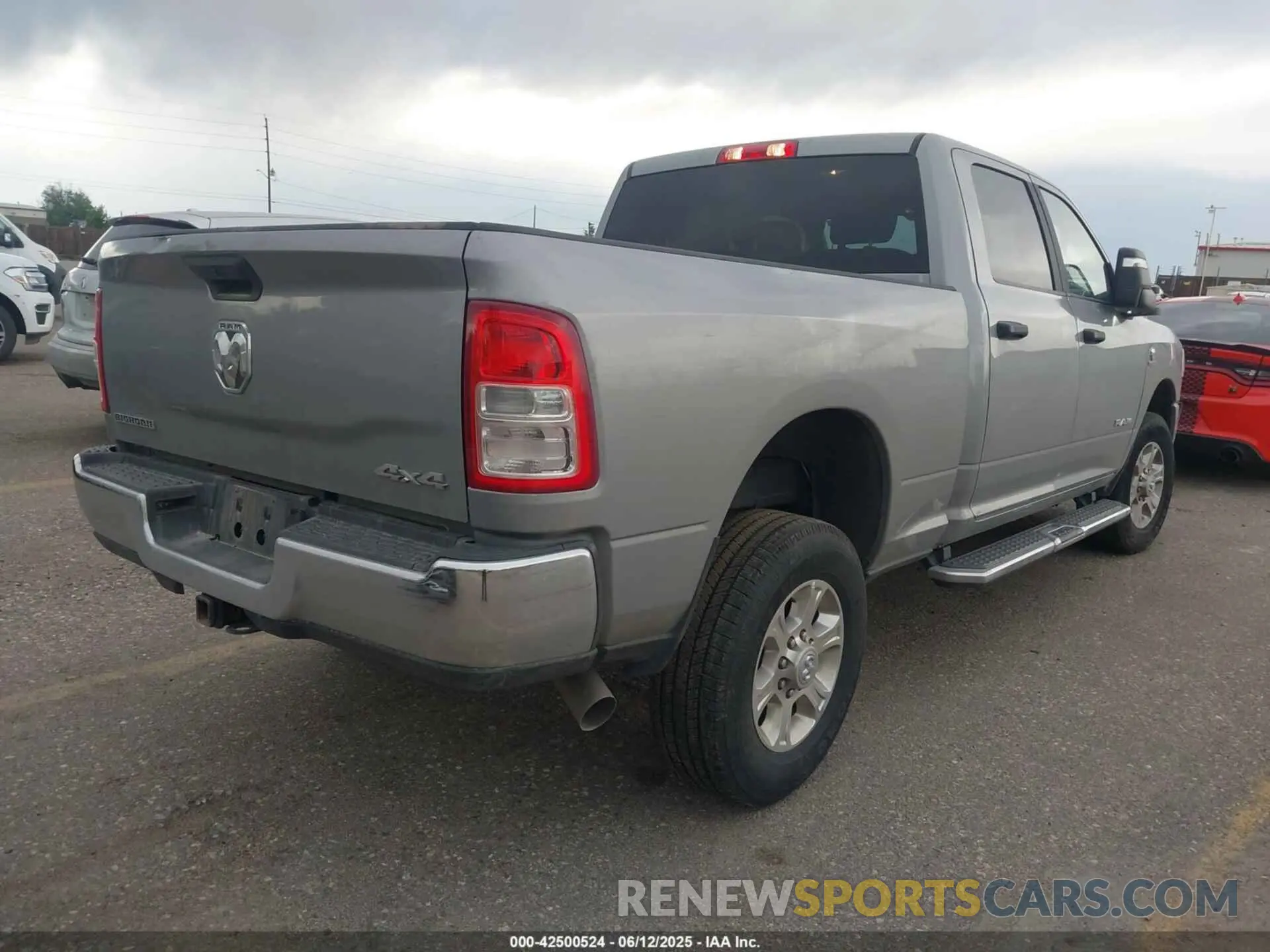 4 Photograph of a damaged car 3C6UR5DL5RG154048 RAM 2500 2024