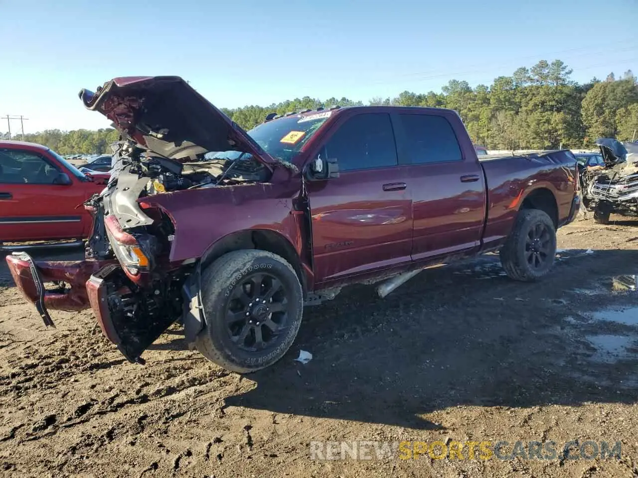 1 Photograph of a damaged car 3C6UR5DL5RG357067 RAM 2500 2024