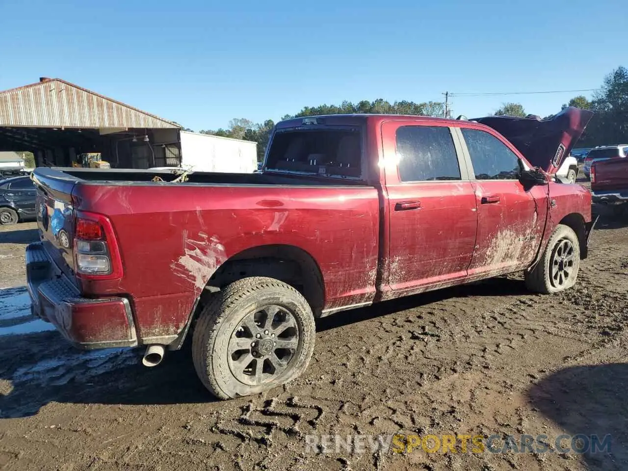 3 Photograph of a damaged car 3C6UR5DL5RG357067 RAM 2500 2024