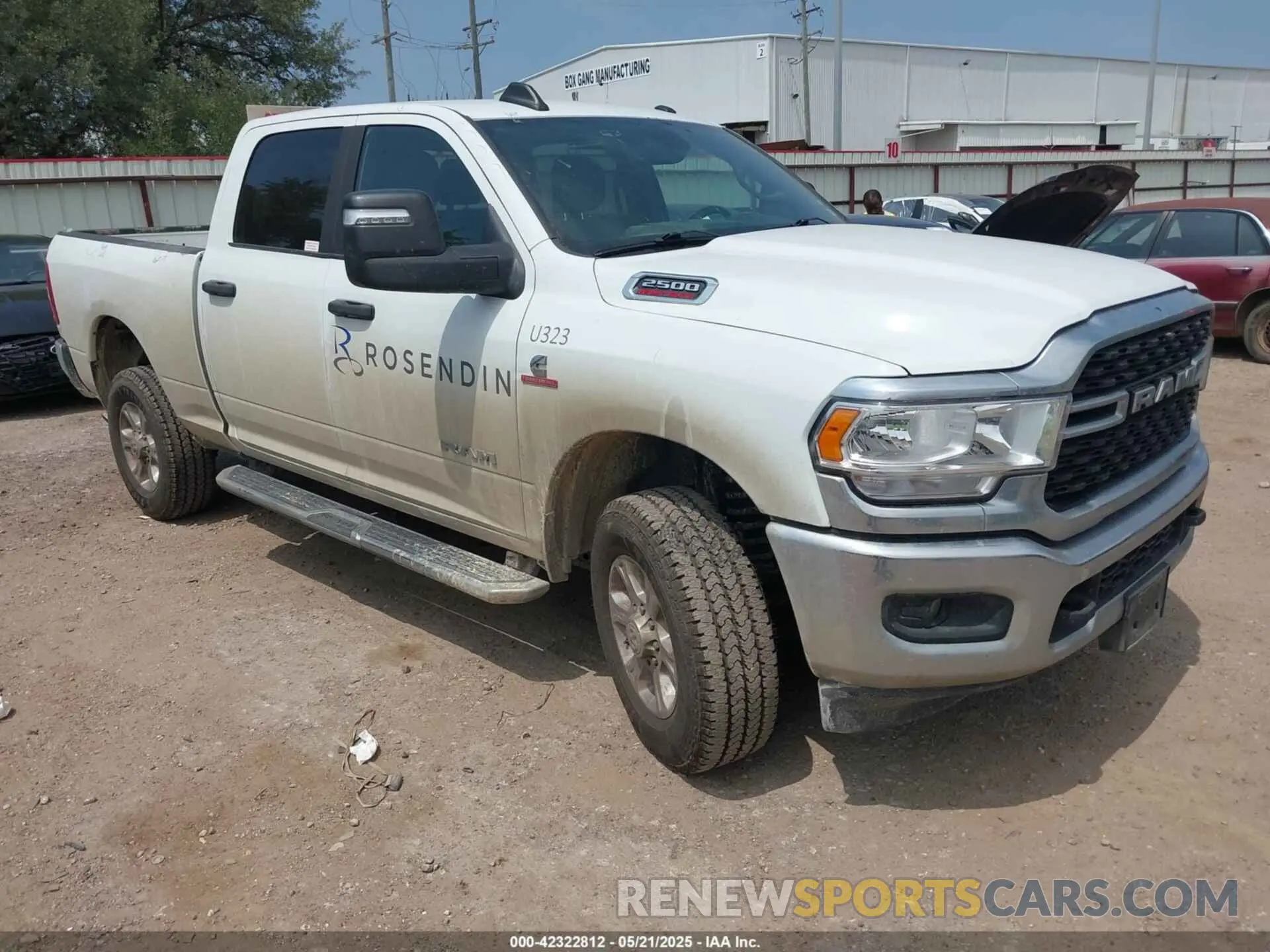 1 Photograph of a damaged car 3C6UR5DL6RG157864 RAM 2500 2024