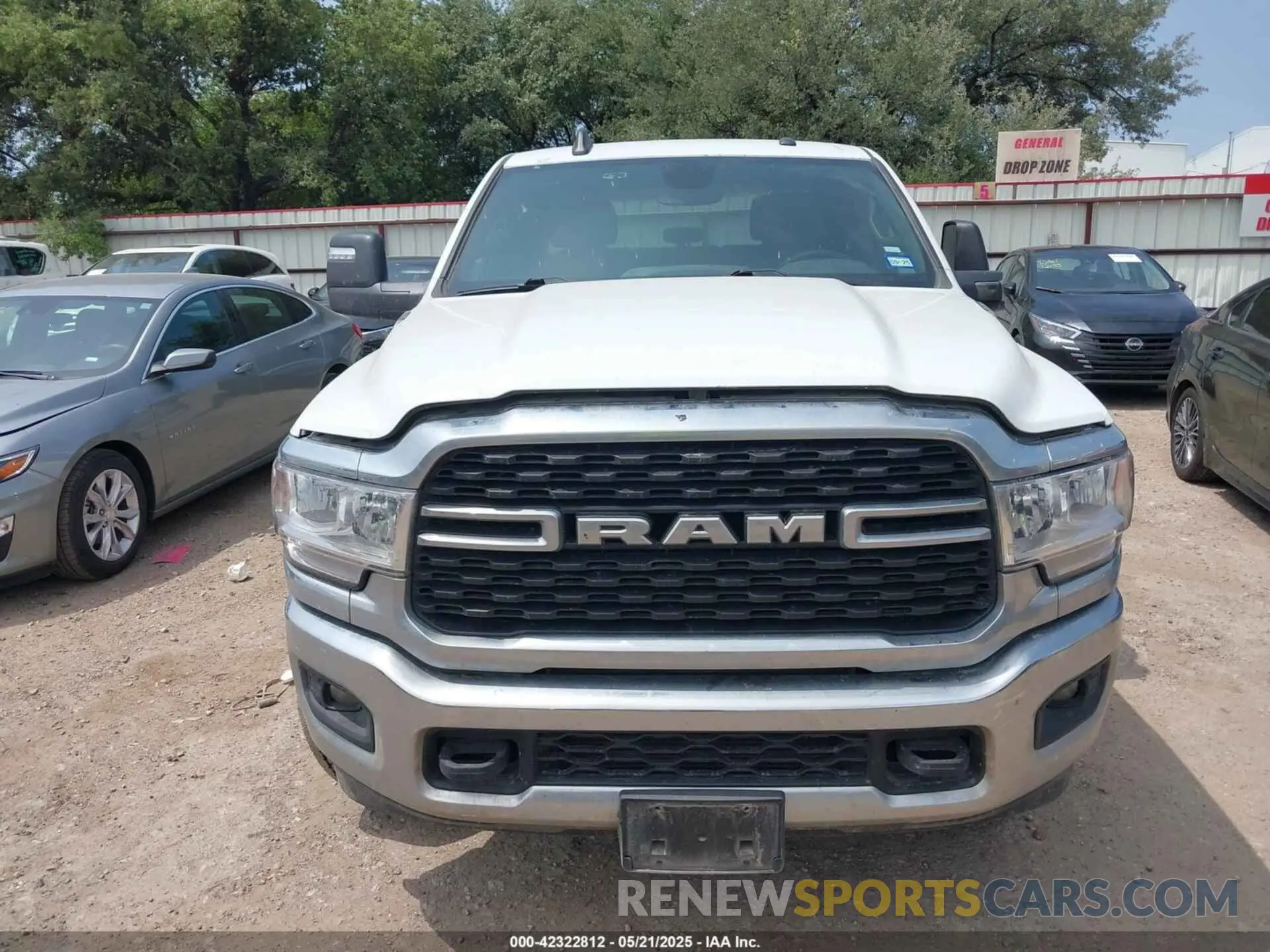 12 Photograph of a damaged car 3C6UR5DL6RG157864 RAM 2500 2024