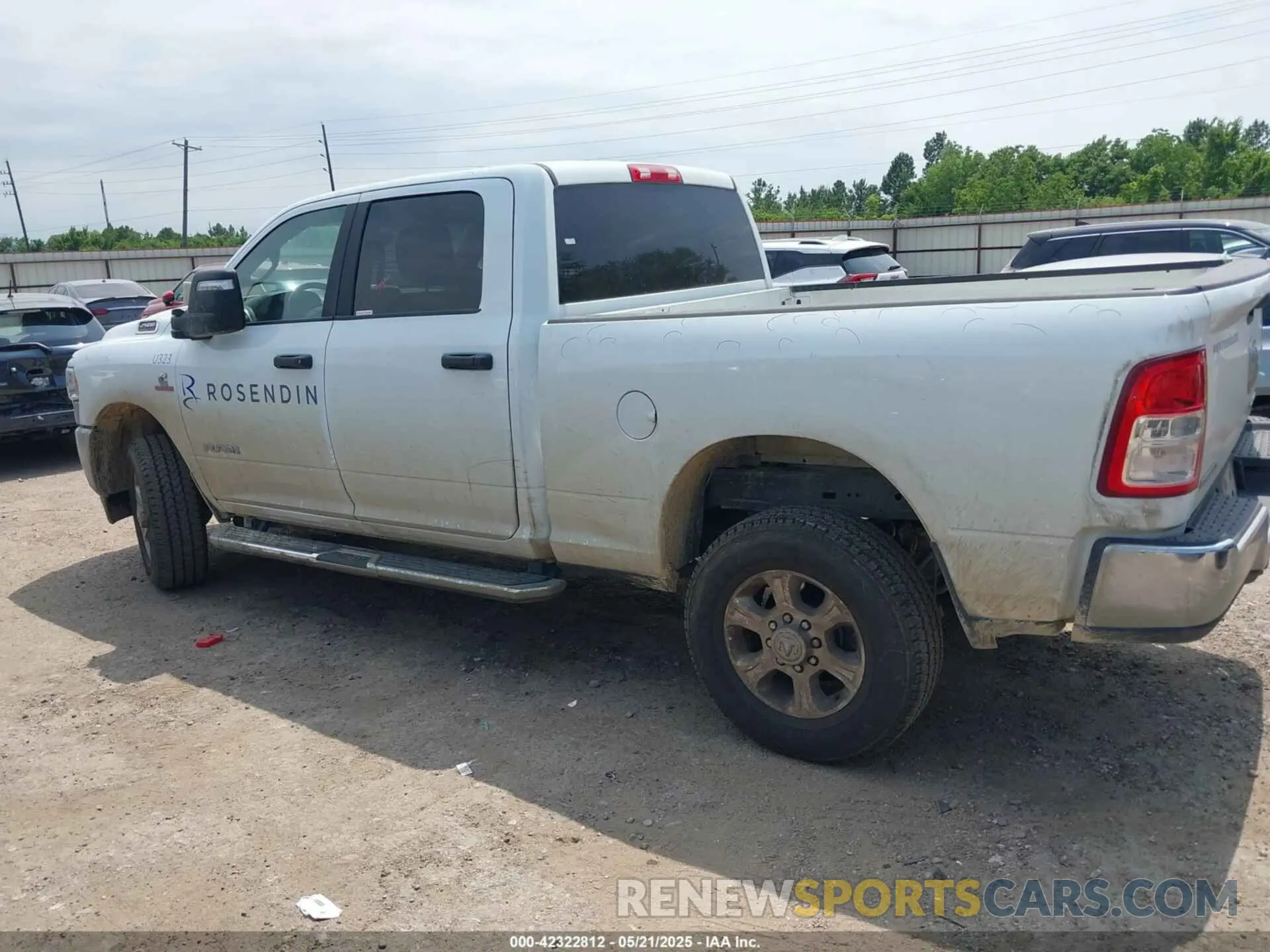 14 Photograph of a damaged car 3C6UR5DL6RG157864 RAM 2500 2024