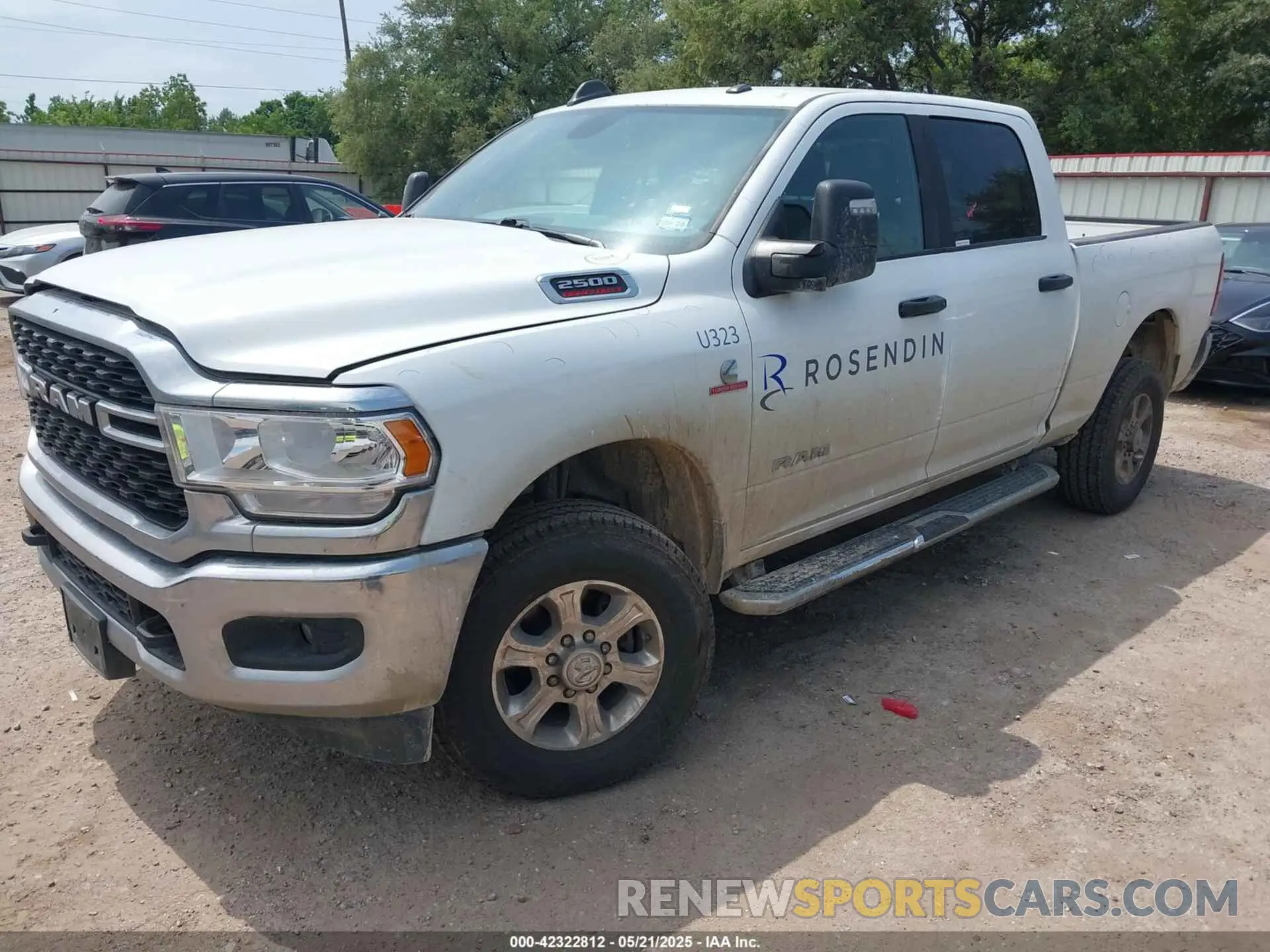 2 Photograph of a damaged car 3C6UR5DL6RG157864 RAM 2500 2024