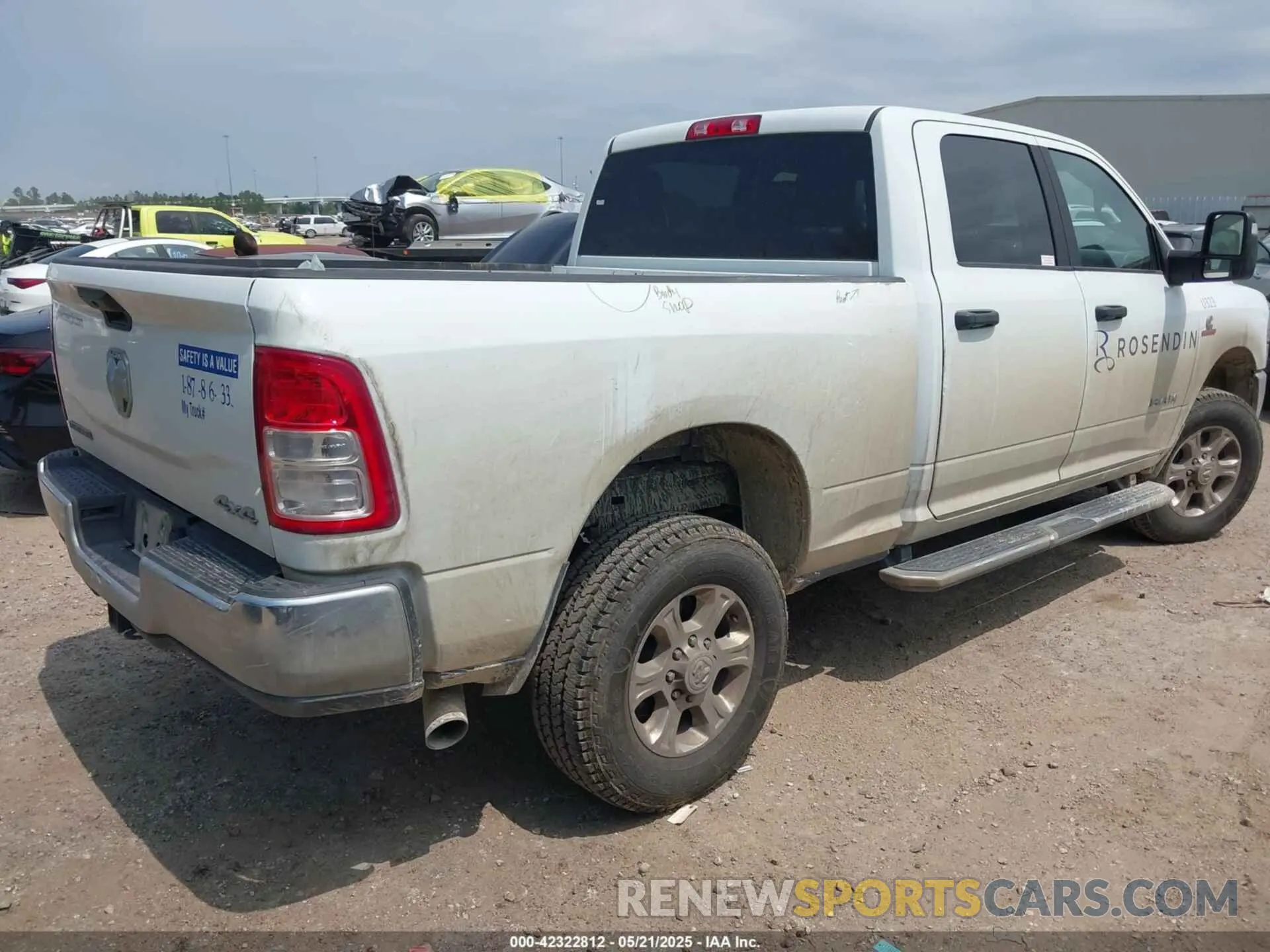 4 Photograph of a damaged car 3C6UR5DL6RG157864 RAM 2500 2024