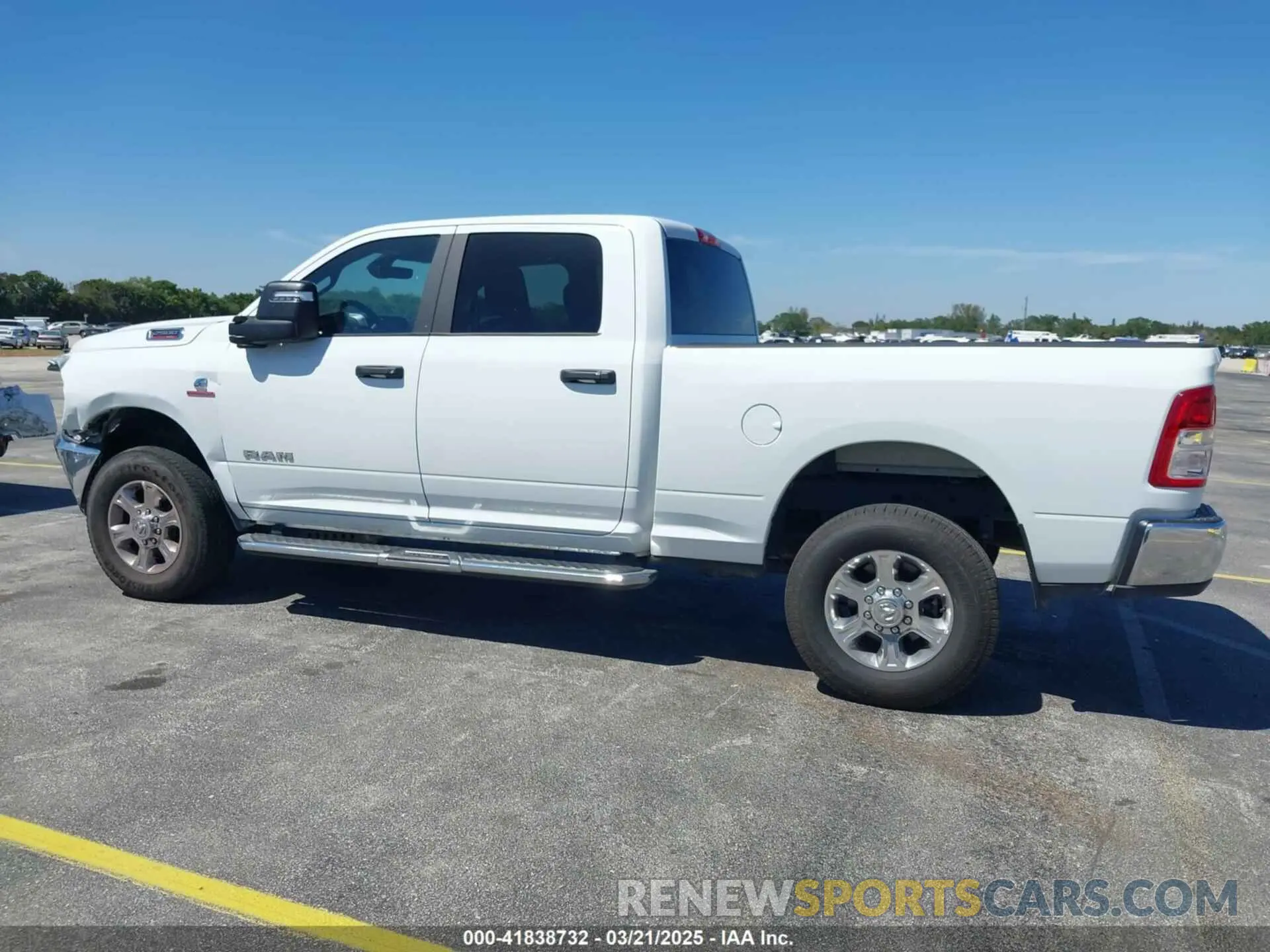 14 Photograph of a damaged car 3C6UR5DL6RG338222 RAM 2500 2024
