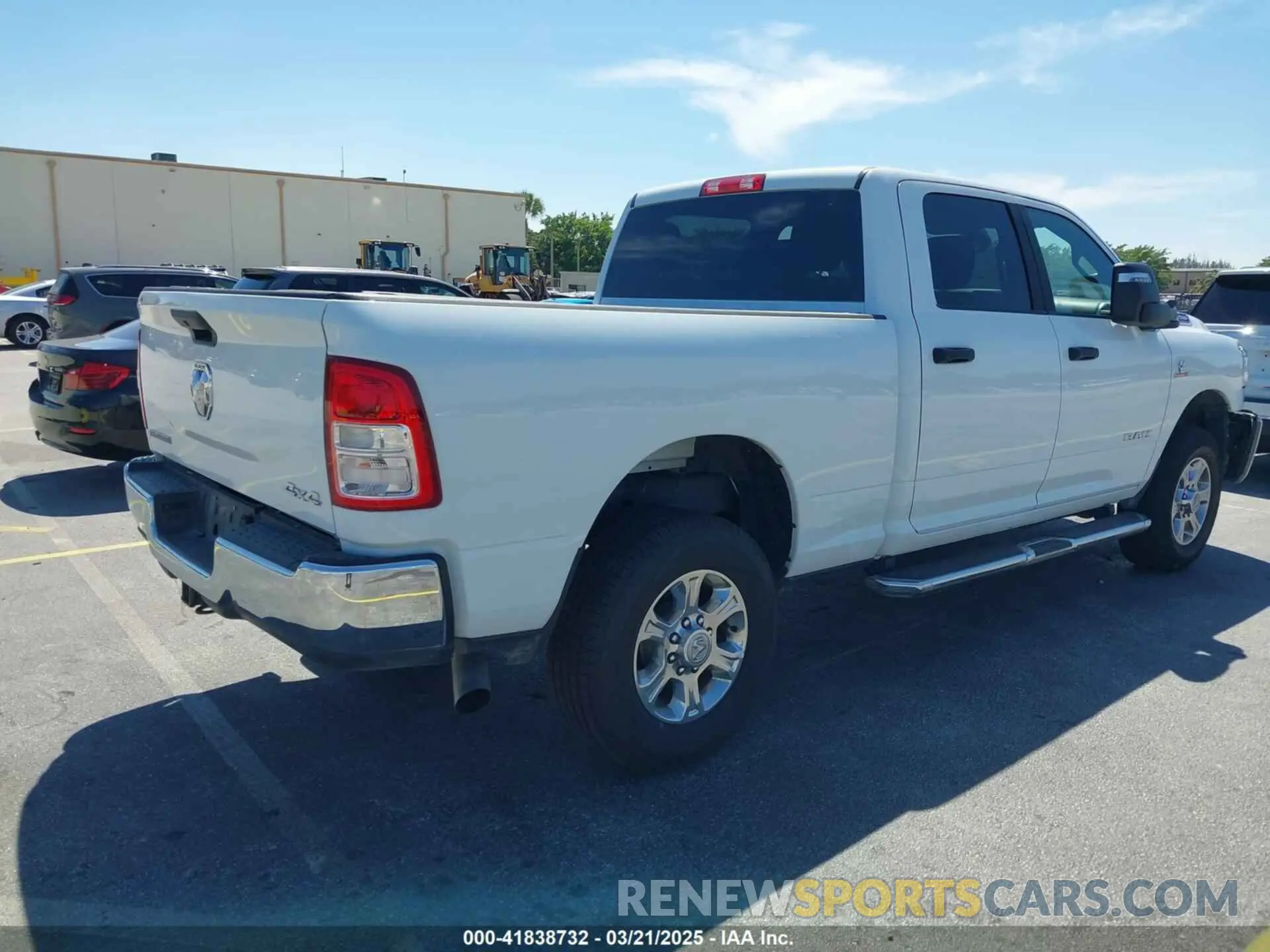 4 Photograph of a damaged car 3C6UR5DL6RG338222 RAM 2500 2024