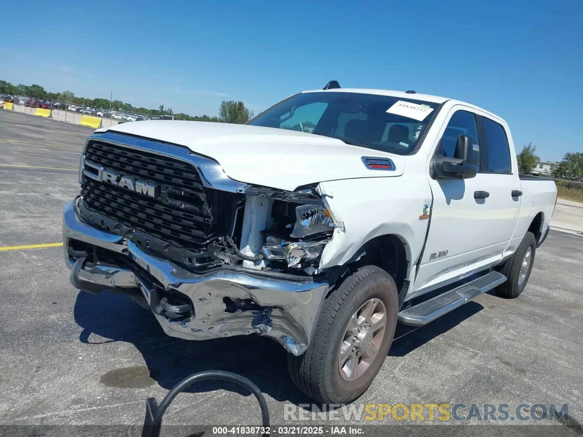 6 Photograph of a damaged car 3C6UR5DL6RG338222 RAM 2500 2024