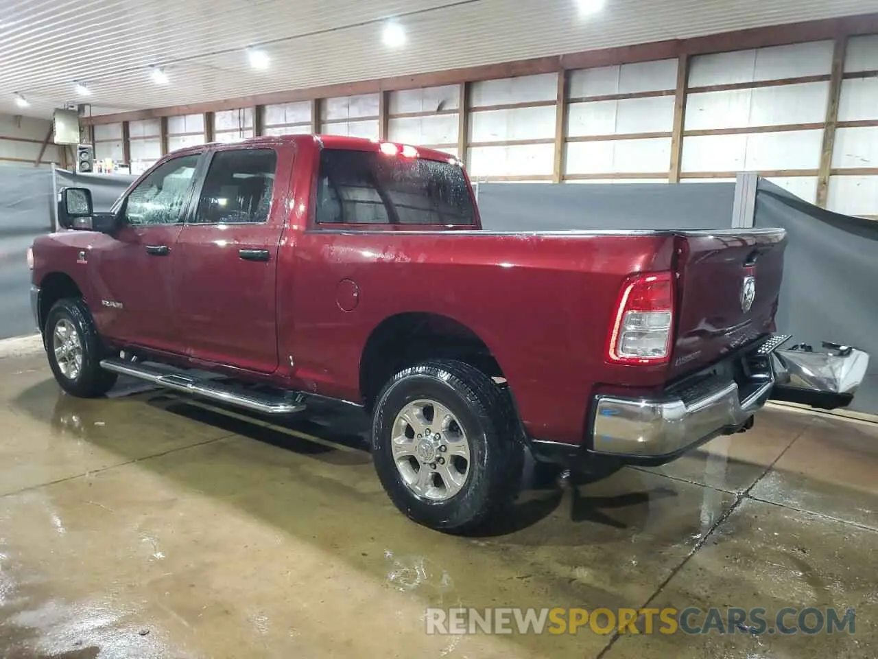 2 Photograph of a damaged car 3C6UR5DL6RG340181 RAM 2500 2024