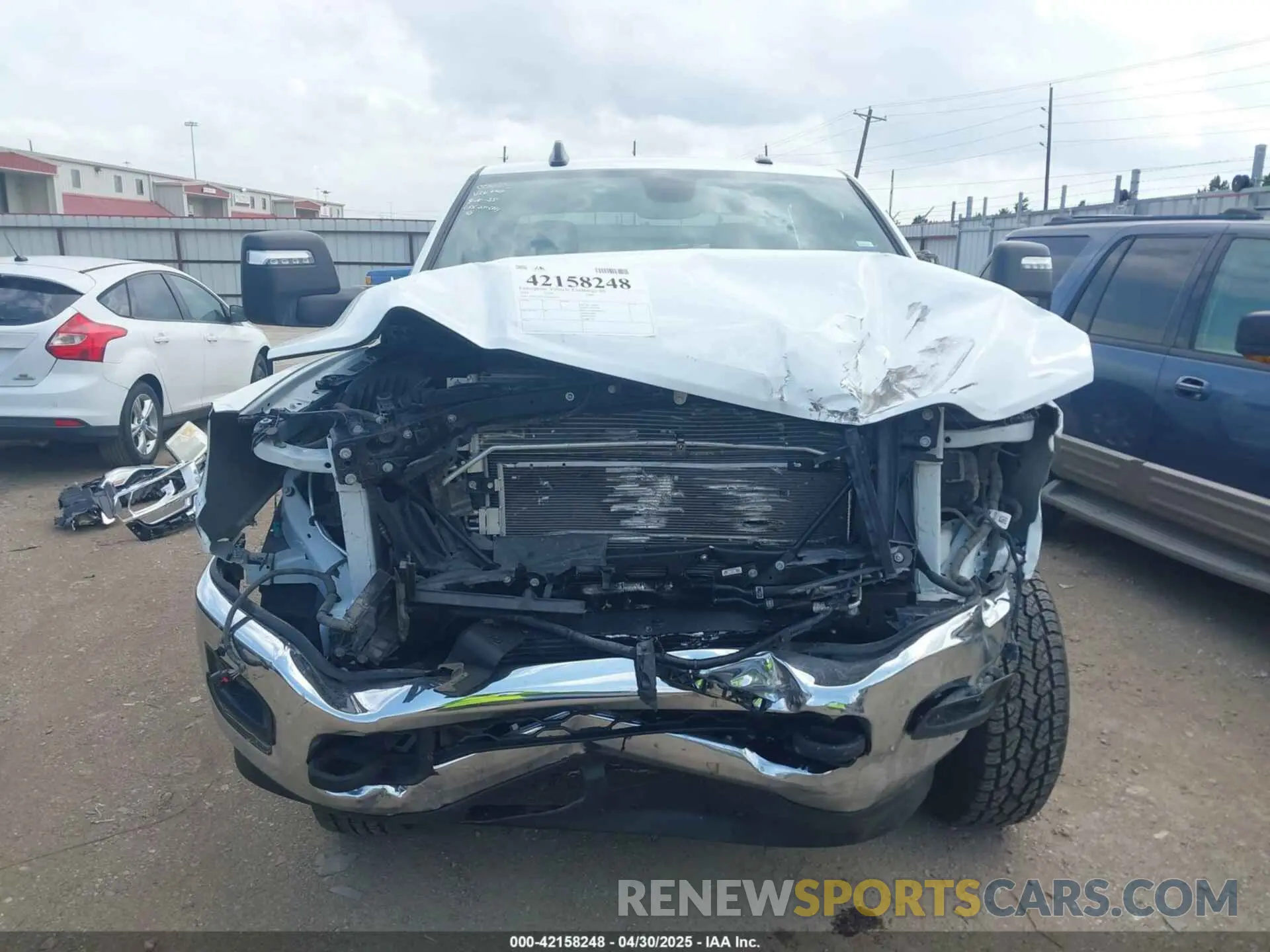 13 Photograph of a damaged car 3C6UR5DL8RG266424 RAM 2500 2024
