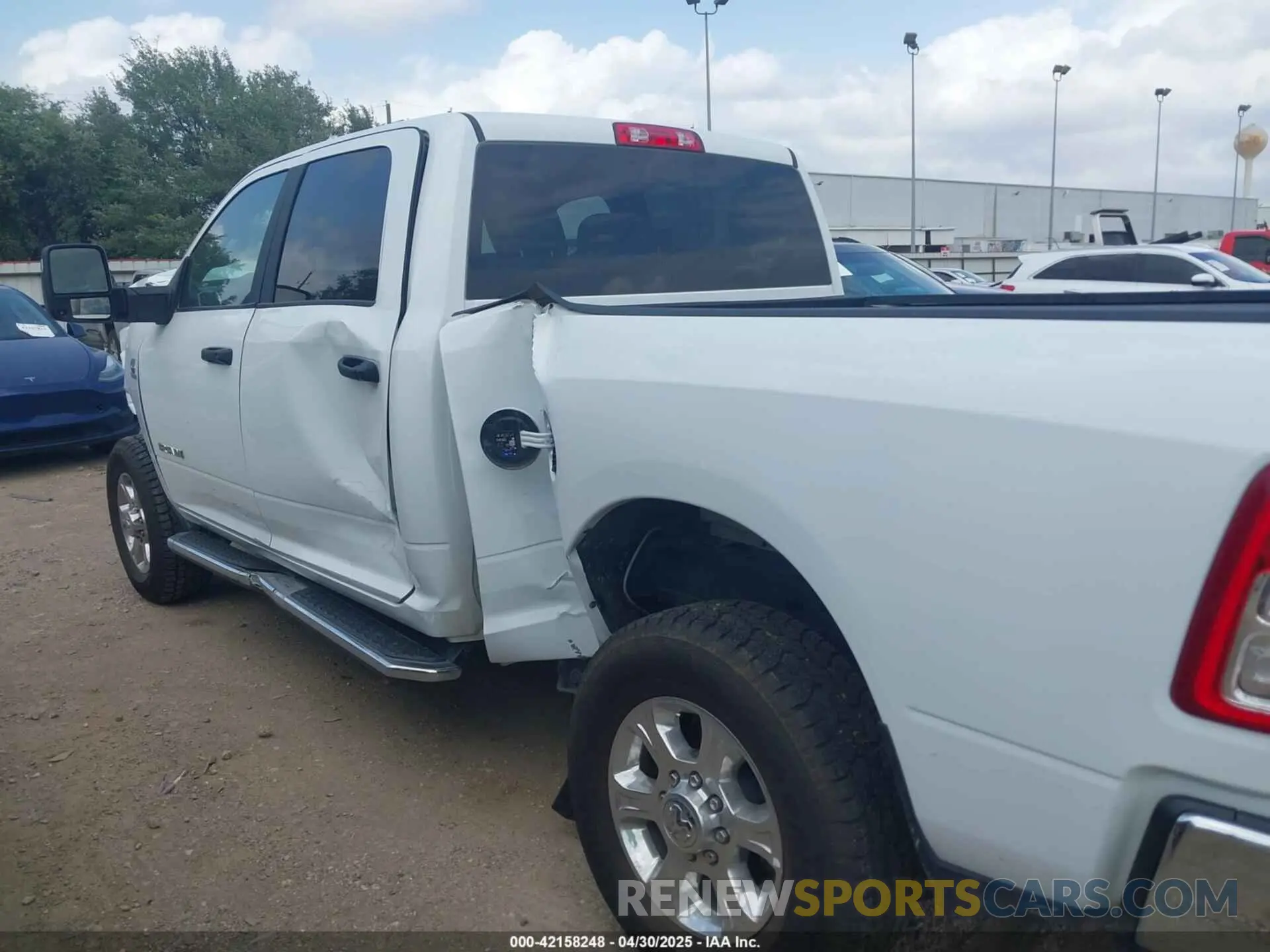 15 Photograph of a damaged car 3C6UR5DL8RG266424 RAM 2500 2024