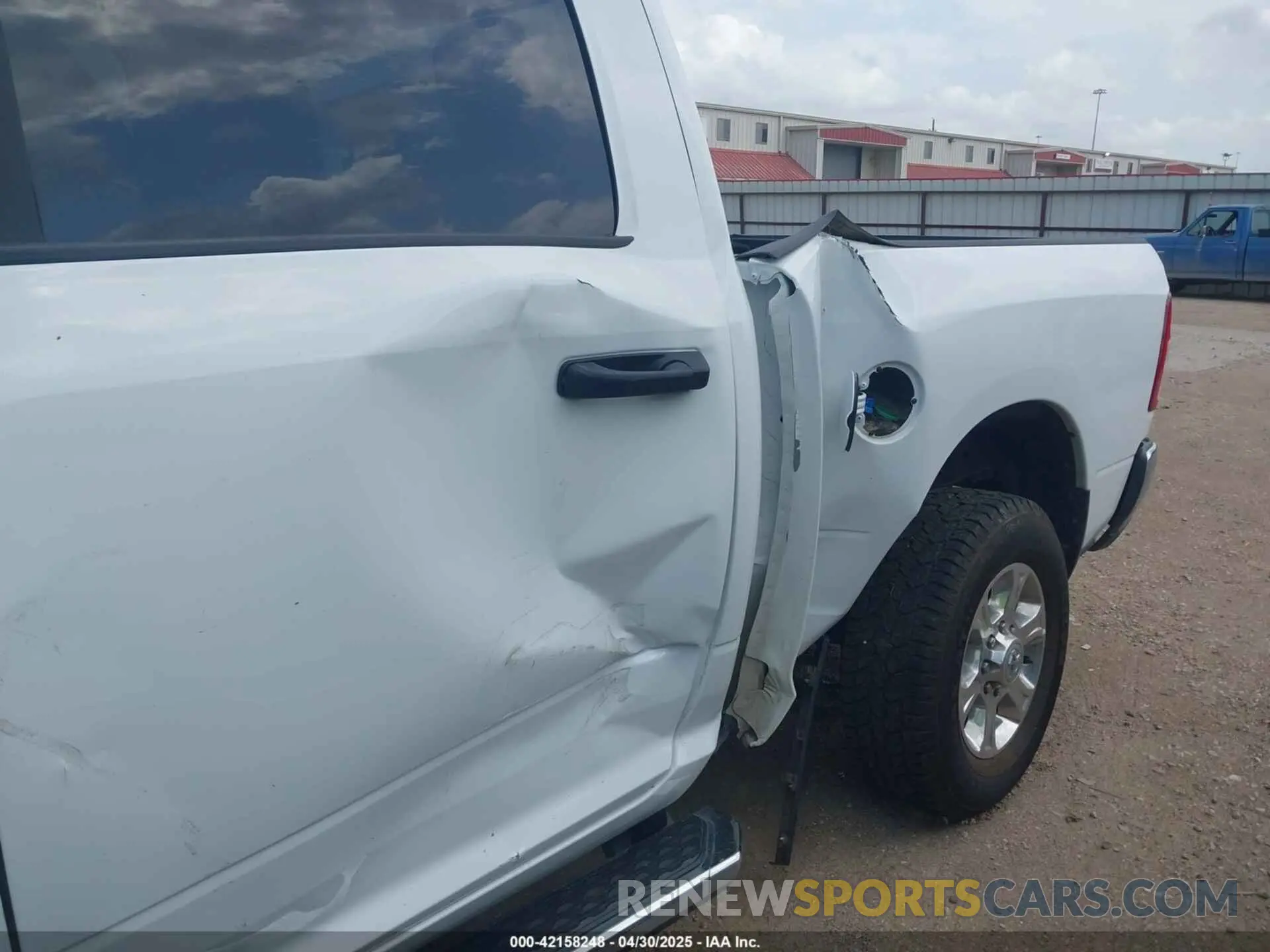 18 Photograph of a damaged car 3C6UR5DL8RG266424 RAM 2500 2024