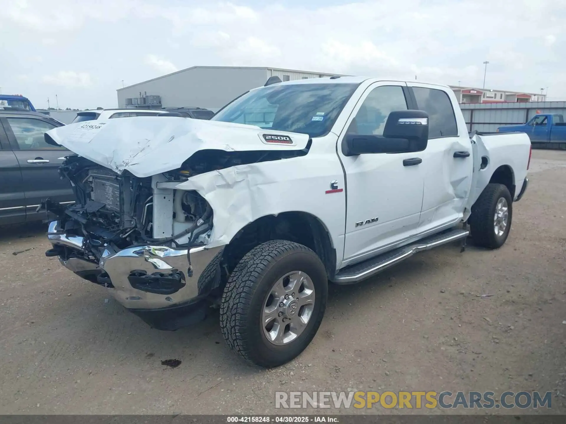 2 Photograph of a damaged car 3C6UR5DL8RG266424 RAM 2500 2024