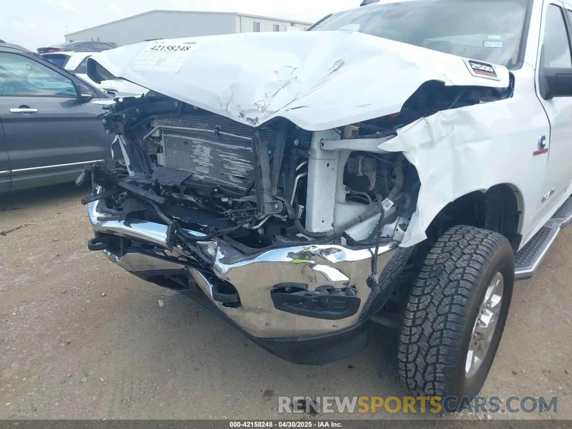 6 Photograph of a damaged car 3C6UR5DL8RG266424 RAM 2500 2024
